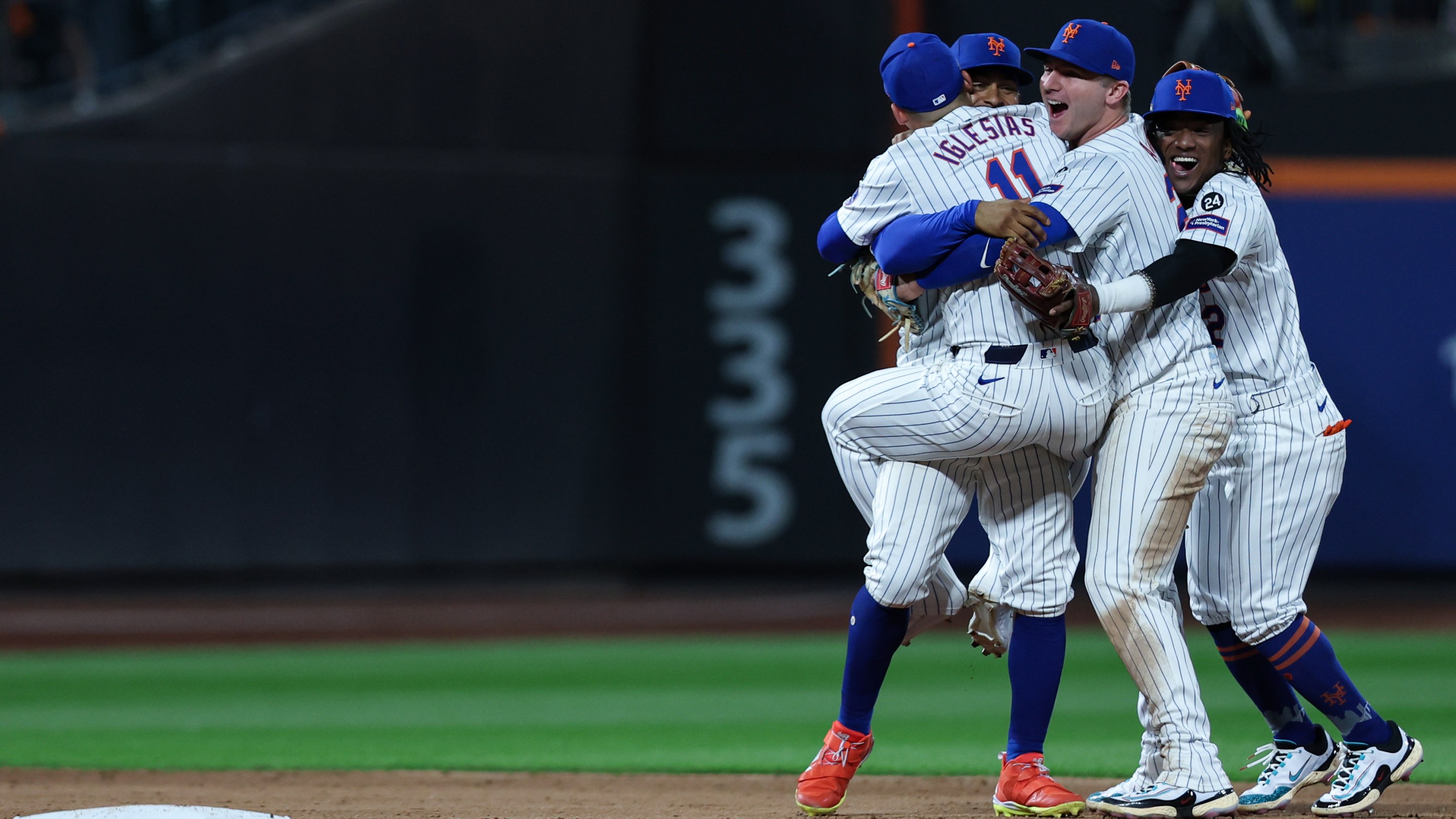 NEW YORK, NY - OCTOBER 09: The New York Mets celebrate after winning Game 4 of the Division Series presented by Booking.com between the Philadelphia Phillies and the New York Mets at Citi Field on Wednesday, October 9, 2024 in New York, New York. The New York Mets won 4-1 and will advance to the NLCS. (Photo by Rob Tringali/MLB Photos via Getty Images)