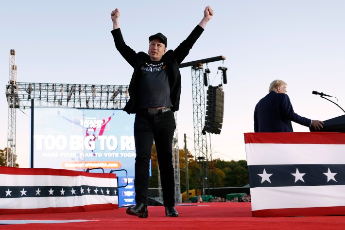 Elon Musk leaves the stage after addressing a campaign rally with Republican presidential nominee, former President Donald Trump, at the Butler Farm Show fairgrounds on October 5, 2024 in Butler, Pennsylvania.