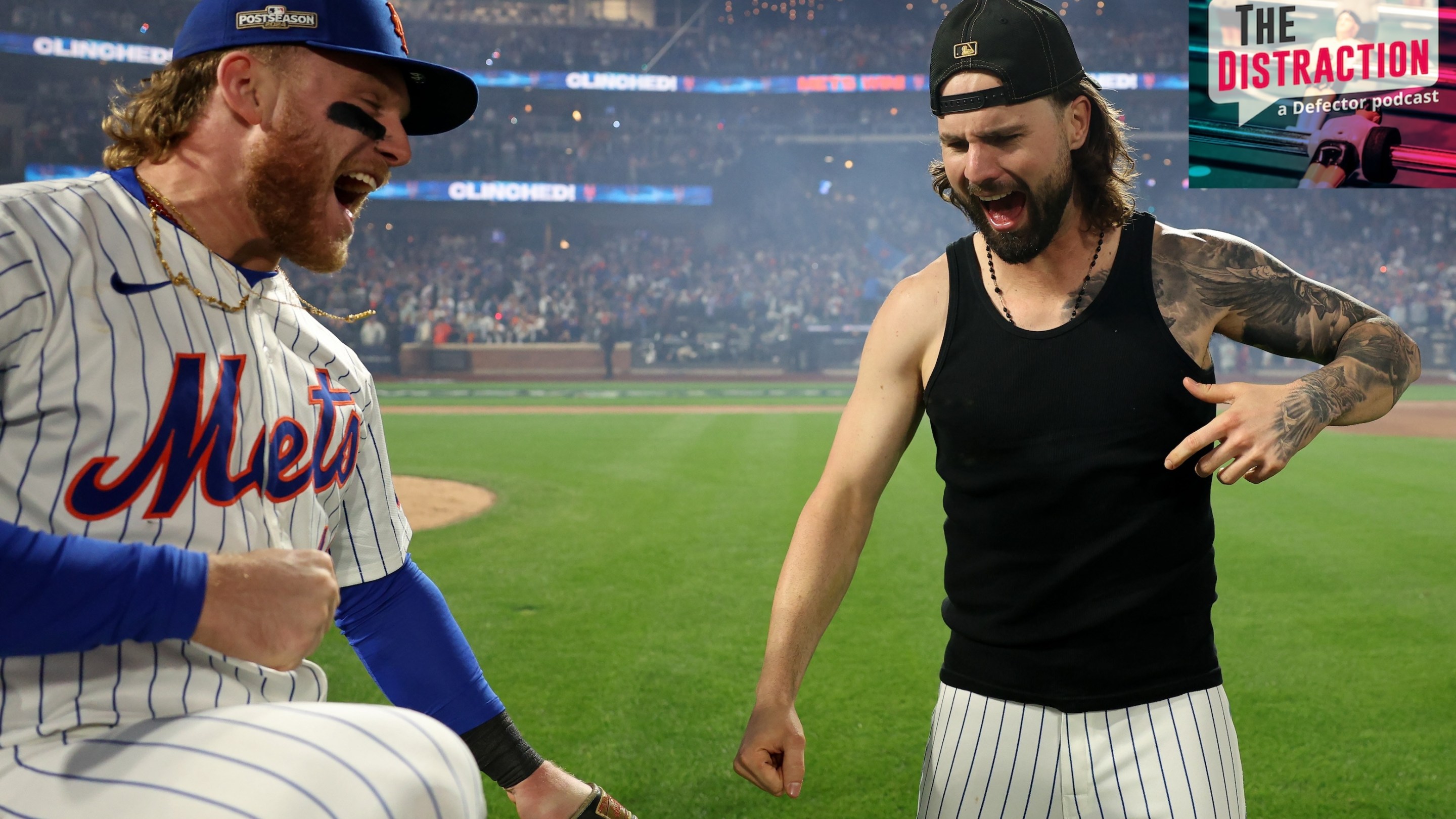 Harrison Bader (left) and Jesse Winker (right) celebrate in the outfield at CitiField after the Mets defeated the Philadelphia Phillies in the NLDS. Bader is yelling; Winker, also yelling, kind of looks like a snake a little bit.