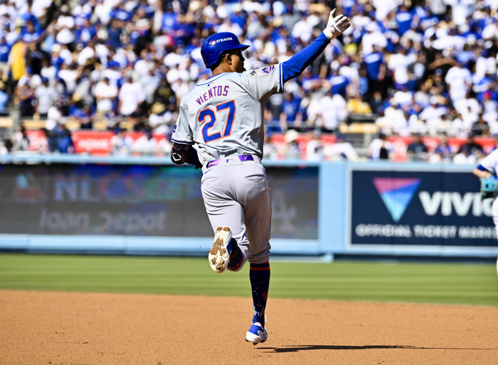 Mark Vientos rounds first base after hitting a grand slam