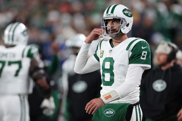 Aaron Rodgers #8 of the New York Jets looks on during the third quarter against the Buffalo Bills at MetLife Stadium on October 14, 2024 in East Rutherford, New Jersey.