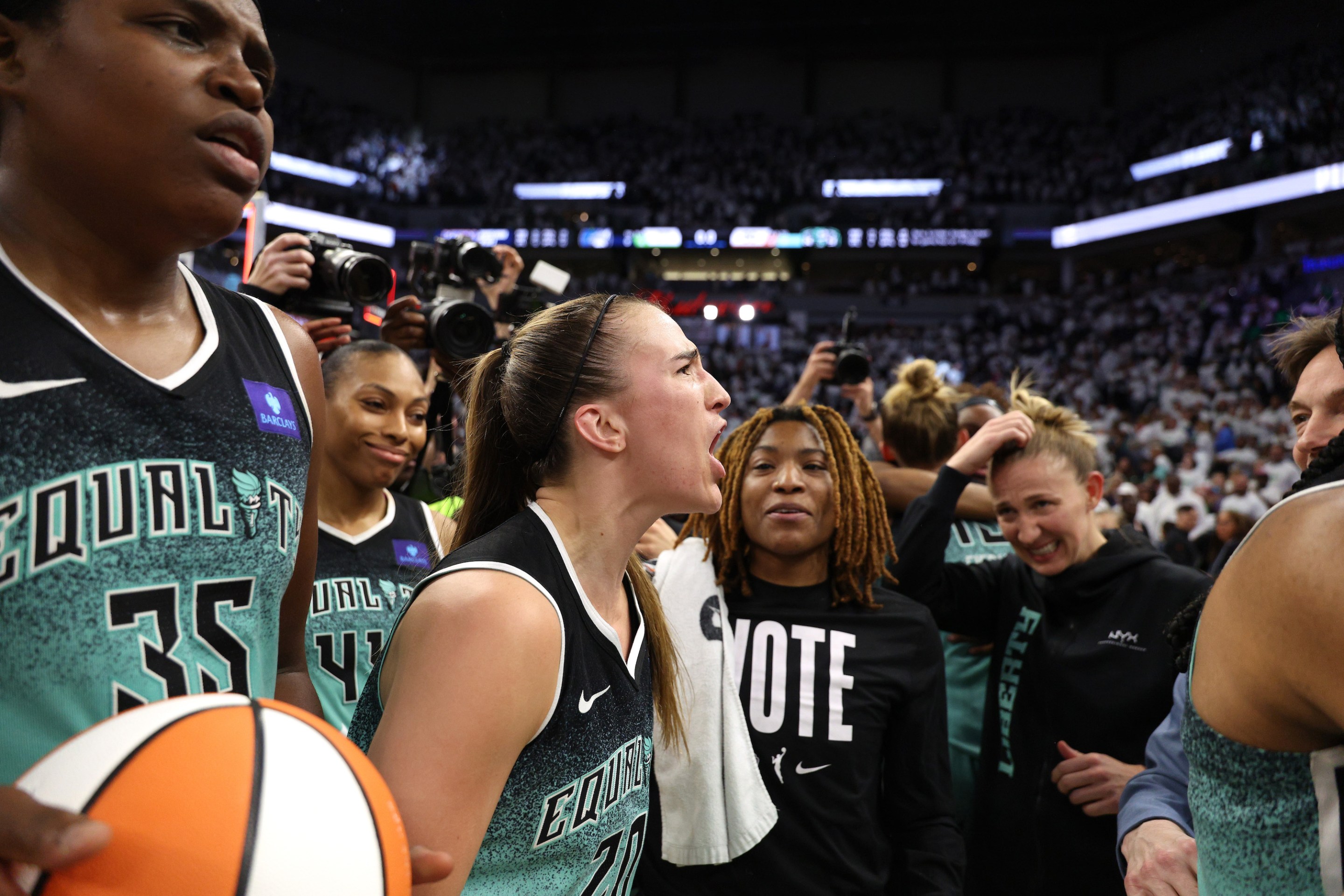 Sabrina Ionescu #20 of the New York Liberty reacts after hitting a game winning three point basket to defeat the Minnesota Lynx 80-77 in Game Three of the WNBA Finals at Target Center on October 16, 2024 in Minneapolis, Minnesota.