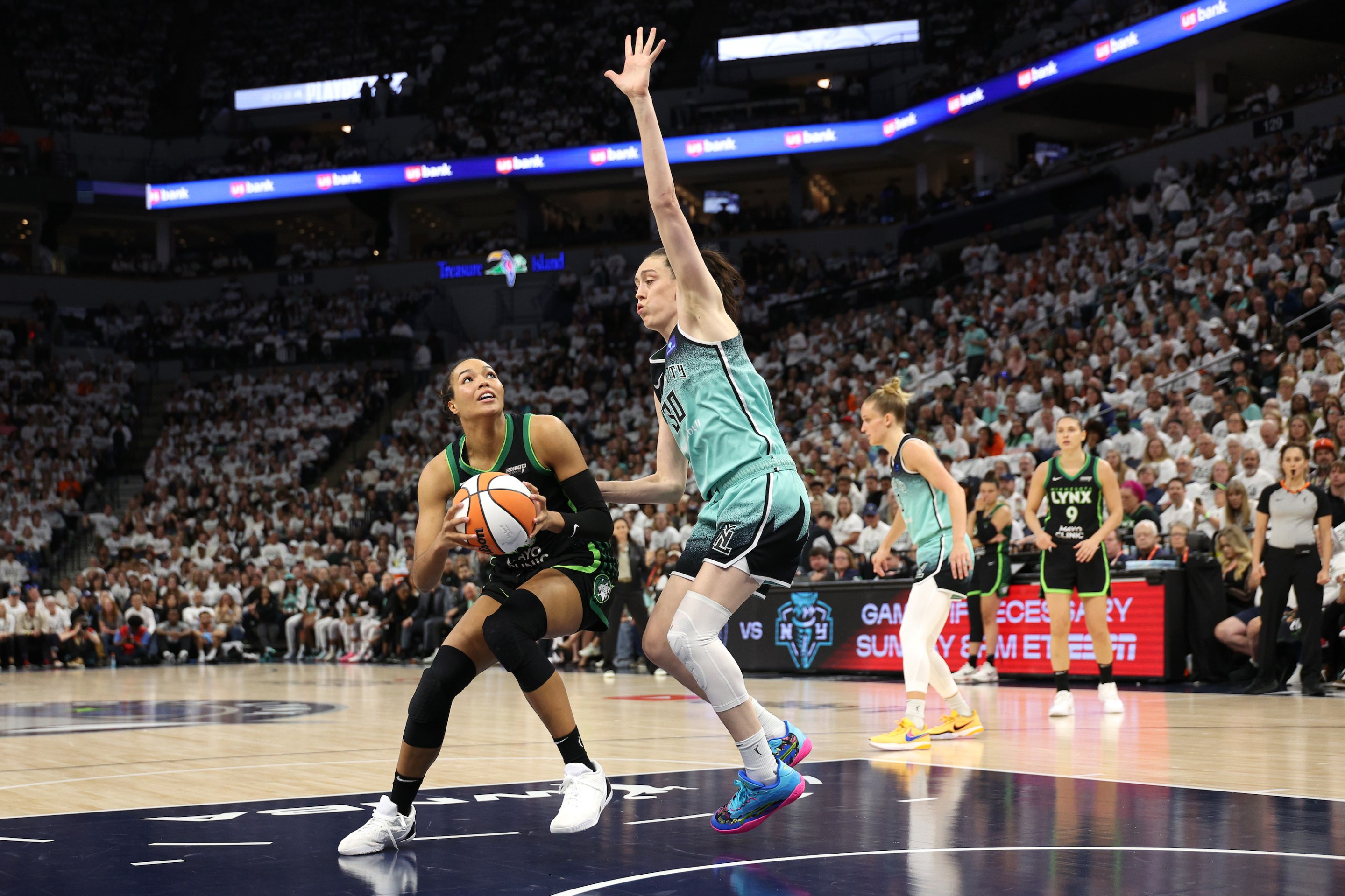 Breanna Stewart #30 of the New York Liberty defends against Napheesa Collier #24 of the Minnesota Lynx d2q in Game Four of the WNBA Finals at Target Center on October 18, 2024 in Minneapolis, Minnesota.