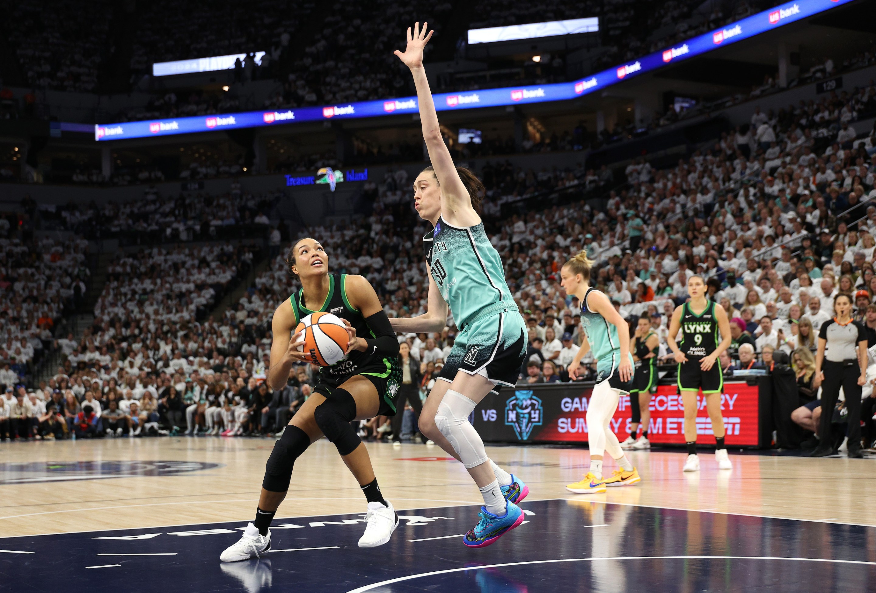 Breanna Stewart #30 of the New York Liberty defends against Napheesa Collier #24 of the Minnesota Lynx d2q in Game Four of the WNBA Finals at Target Center on October 18, 2024 in Minneapolis, Minnesota.