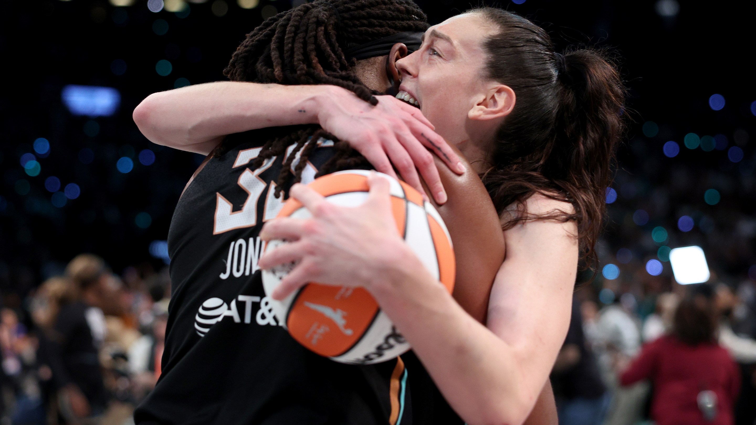 Jonquel Jones #35 and Breanna Stewart #30 of the New York Liberty celebrate after winning Game Five of the WNBA Finals against the Minnesota Lynx at Barclays Center on October 20, 2024 in the Brooklyn borough of New York City. The New York Liberty defeated the Minnesota Lynx 67-62 in overtime to win the championship.