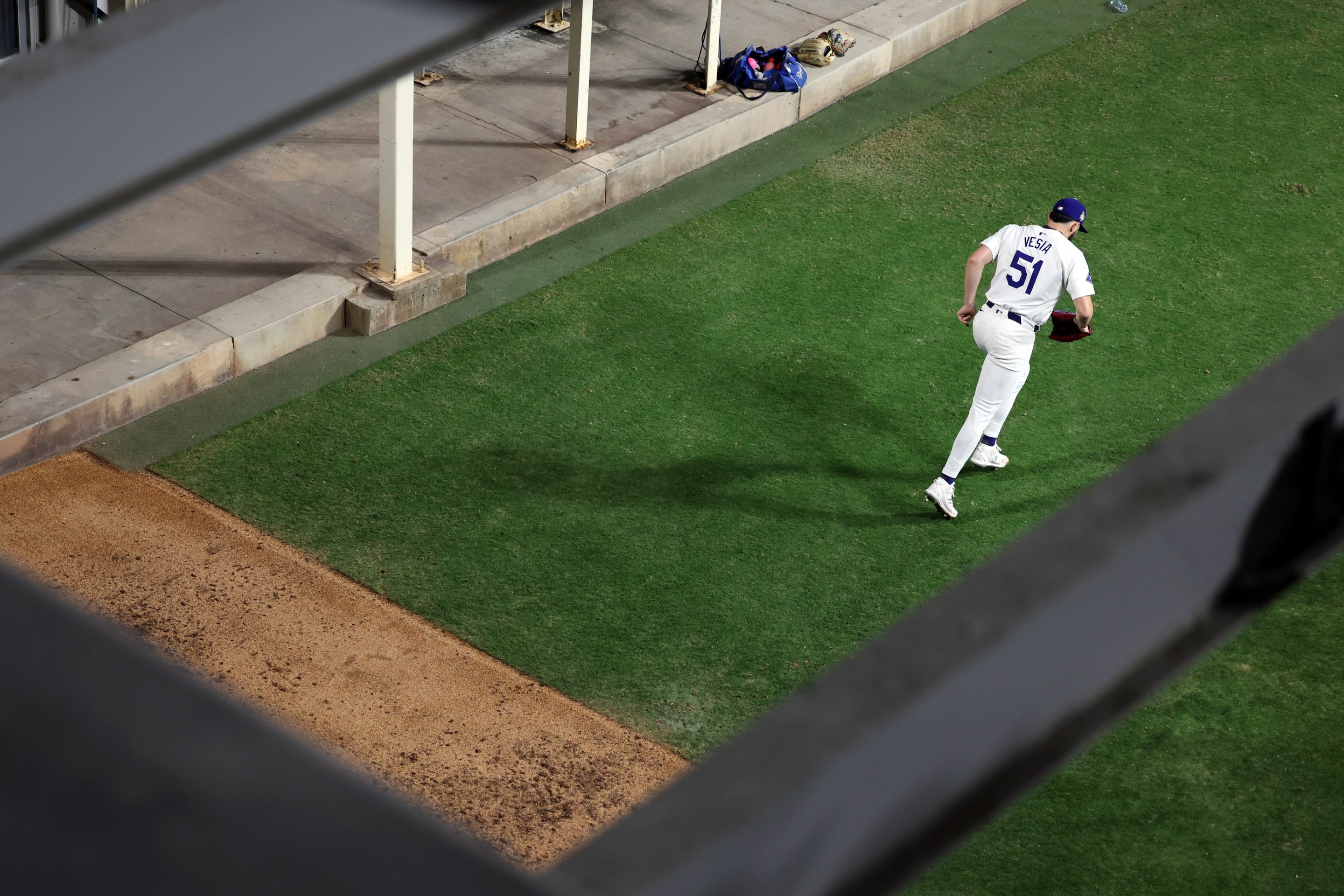 Alex Vesia of the Los Angeles Dodges runs in from the bullpen at Dodger Stadium during Game 2 of the 2024 World Series.