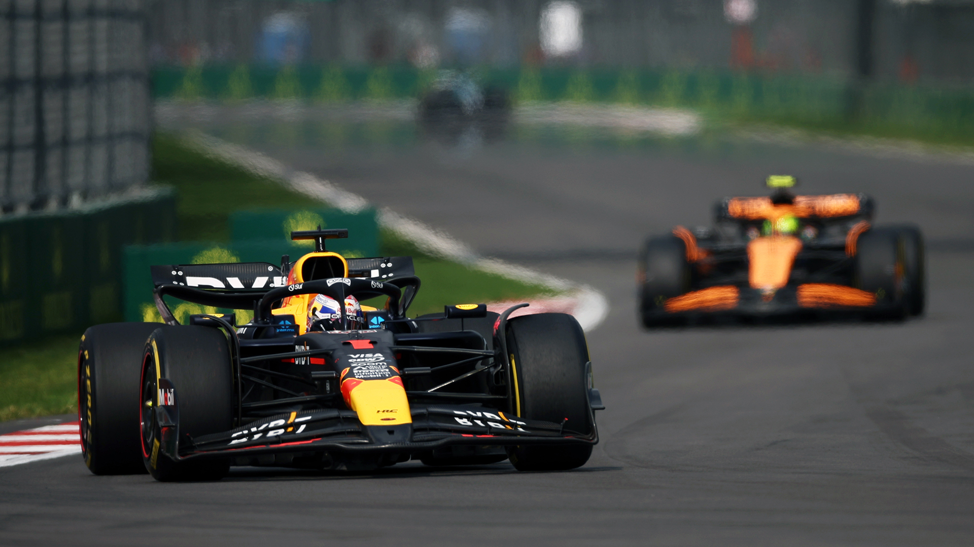 Max Verstappen of the Netherlands driving the (1) Oracle Red Bull Racing RB20 leads Lando Norris of Great Britain driving the (4) McLaren MCL38 Mercedes on track during the F1 Grand Prix of Mexico at Autodromo Hermanos Rodriguez on October 27, 2024 in Mexico City, Mexico