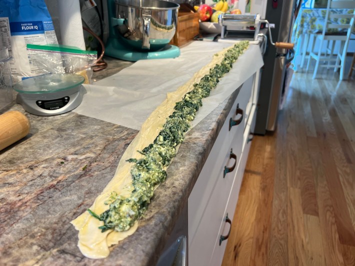 Filling in a line on top of phyllo dough.