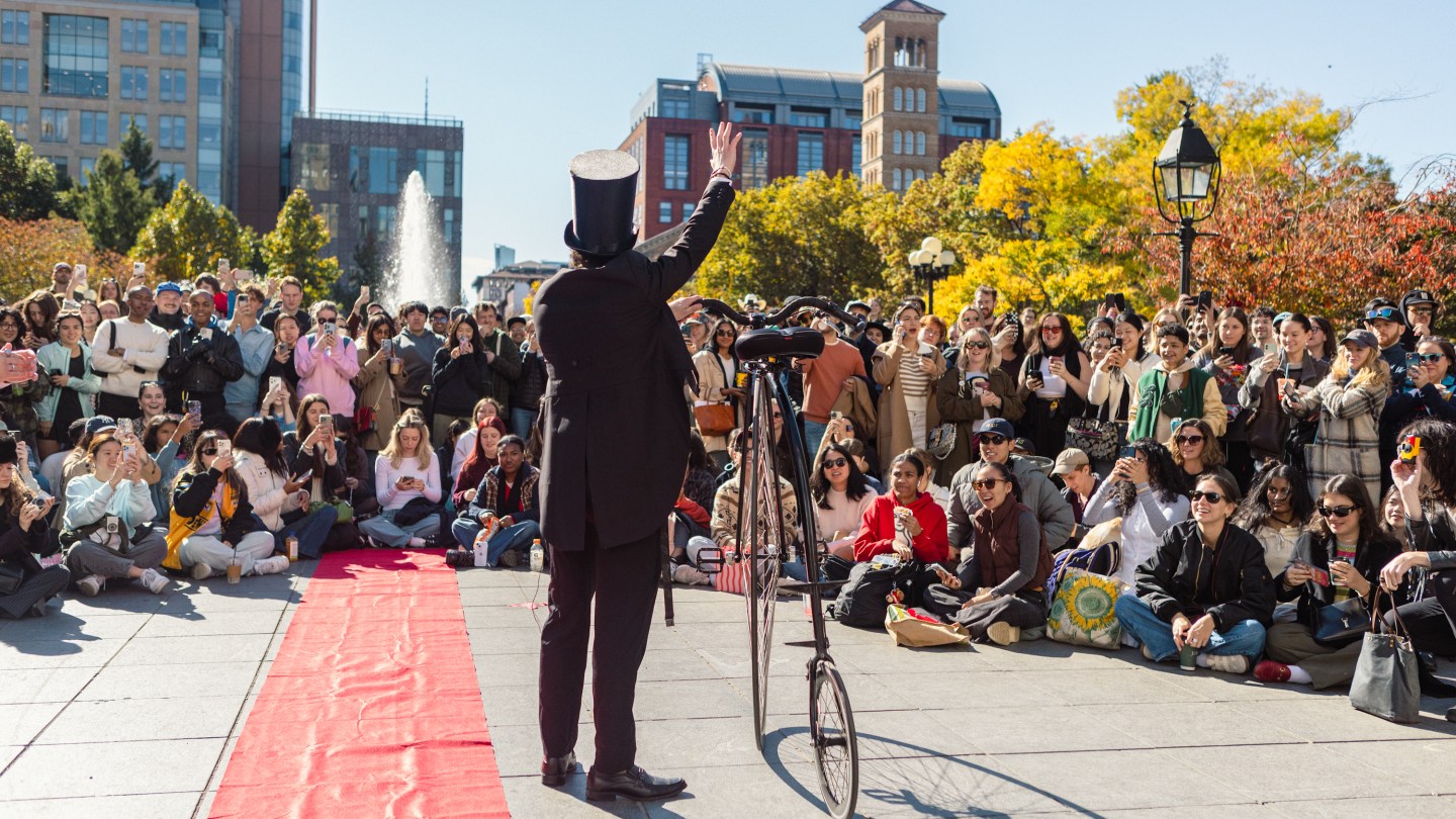 “Gilbert”—the Partiful-invite alias of Anthony Po—made his grand entrance to Washington Square Park with a penny farthing bicycle.