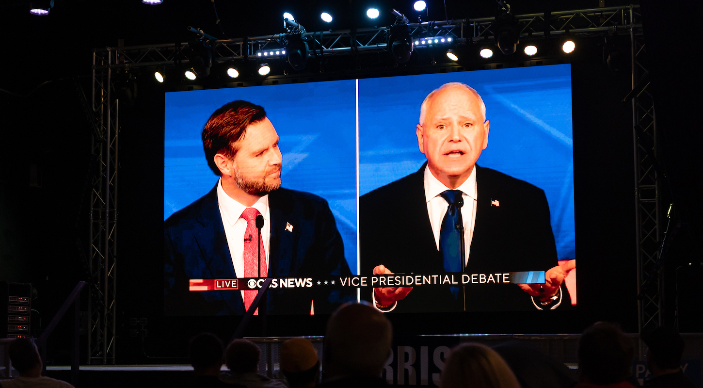 A monitor shows the CBS News broadcast of the Vice Presidential Debate between US Senator and Republican vice presidential candidate J.D. Vance and Democratic vice presidential candidate Tim Walz in Harrisburg, PA, on October 1, 2024, at a watch party.