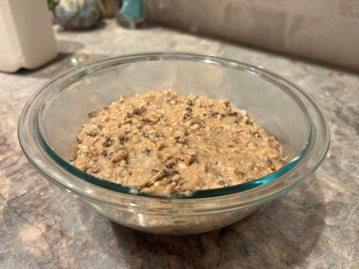 Spotted Dick mixture in a greased bowl.