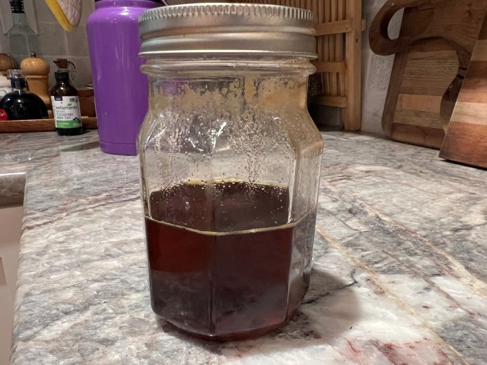 A jar of caramel syrup.