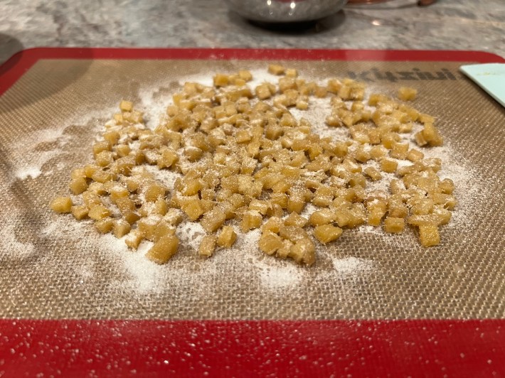 Tiny cubes of cooked ginger, dusted with caster sugar.