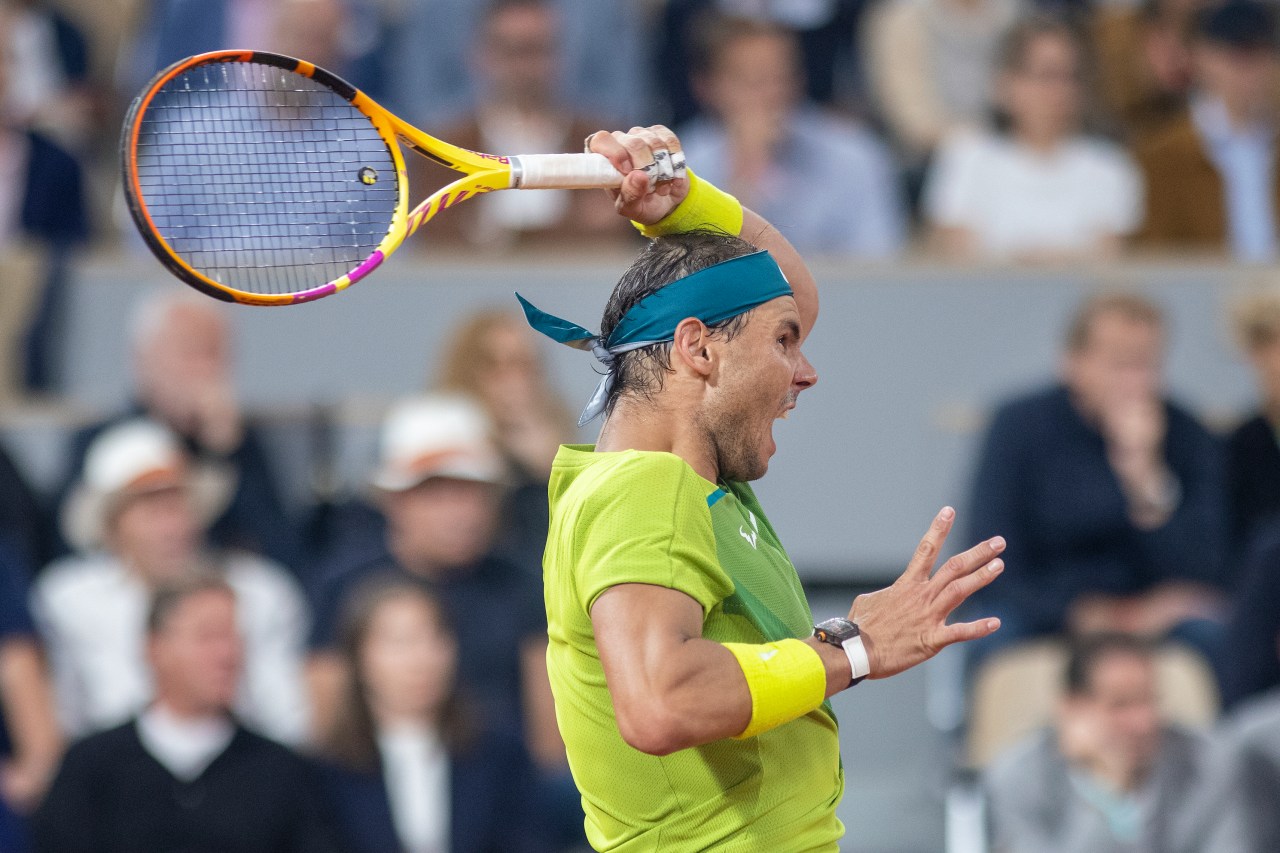 Rafael Nadal swinging his racquet.