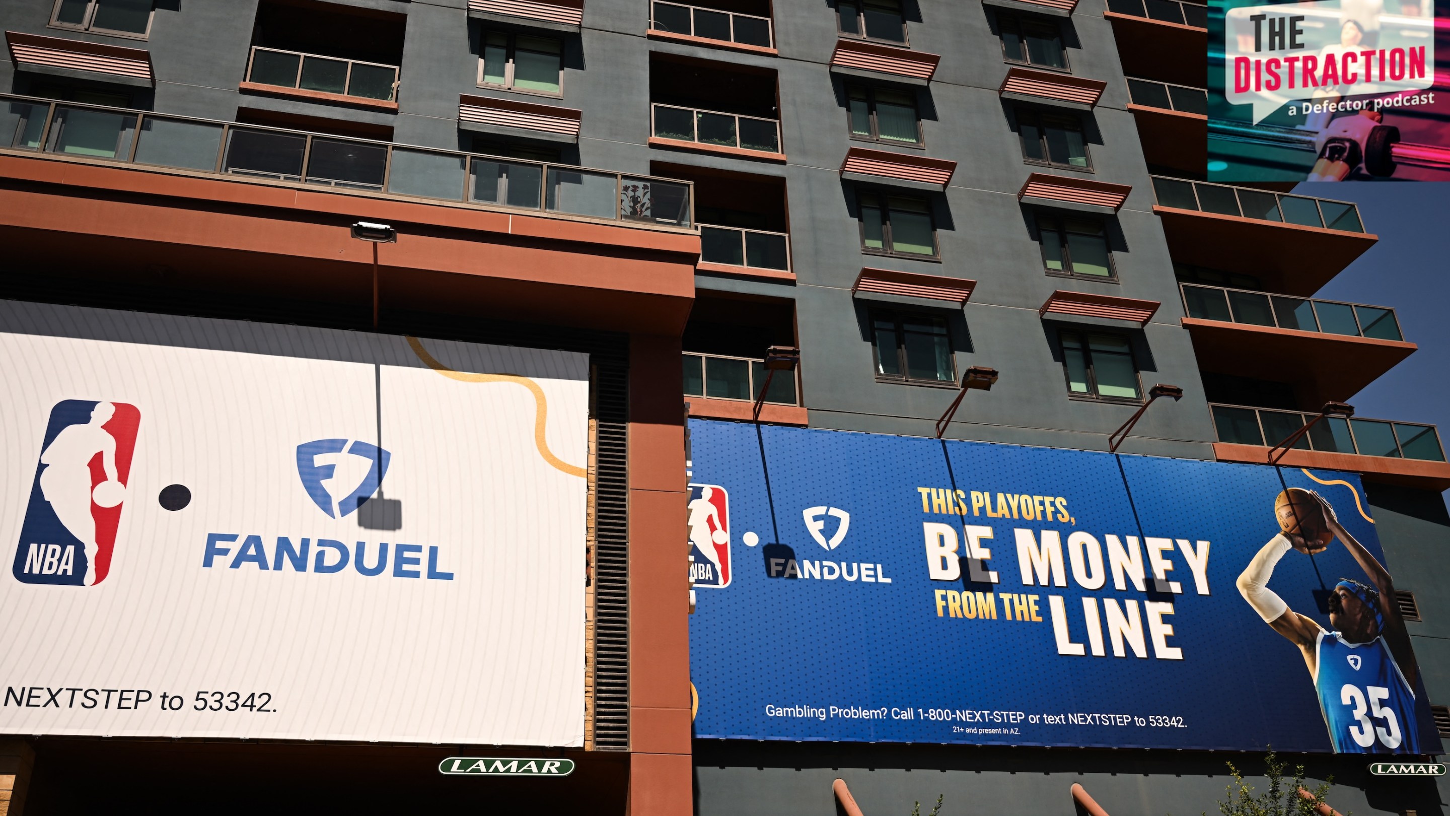 NBA and FanDuel online sports betting signage is displayed on the side of a building in Phoenix, Arizona.