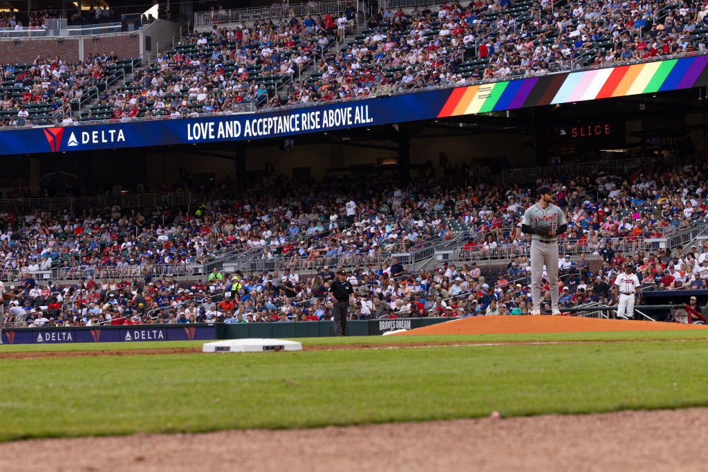 A Delta Air Lines banner ad for Pride Night is seen behind Casey Mize #12 of the Detroit Tigers as he pitches