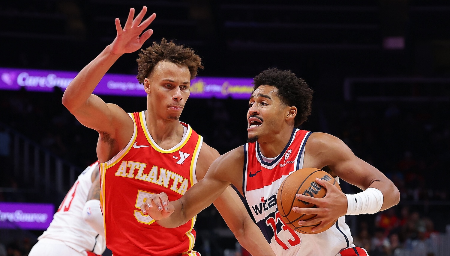 ATLANTA, GEORGIA - OCTOBER 28: Jordan Poole #13 of the Washington Wizards drives against Dyson Daniels #5 of the Atlanta Hawks during the first quarter at State Farm Arena on October 28, 2024 in Atlanta, Georgia. NOTE TO USER: User expressly acknowledges and agrees that, by downloading and/or using this photograph, user is consenting to the terms and conditions of the Getty Images License Agreement. (Photo by Kevin C. Cox/Getty Images)