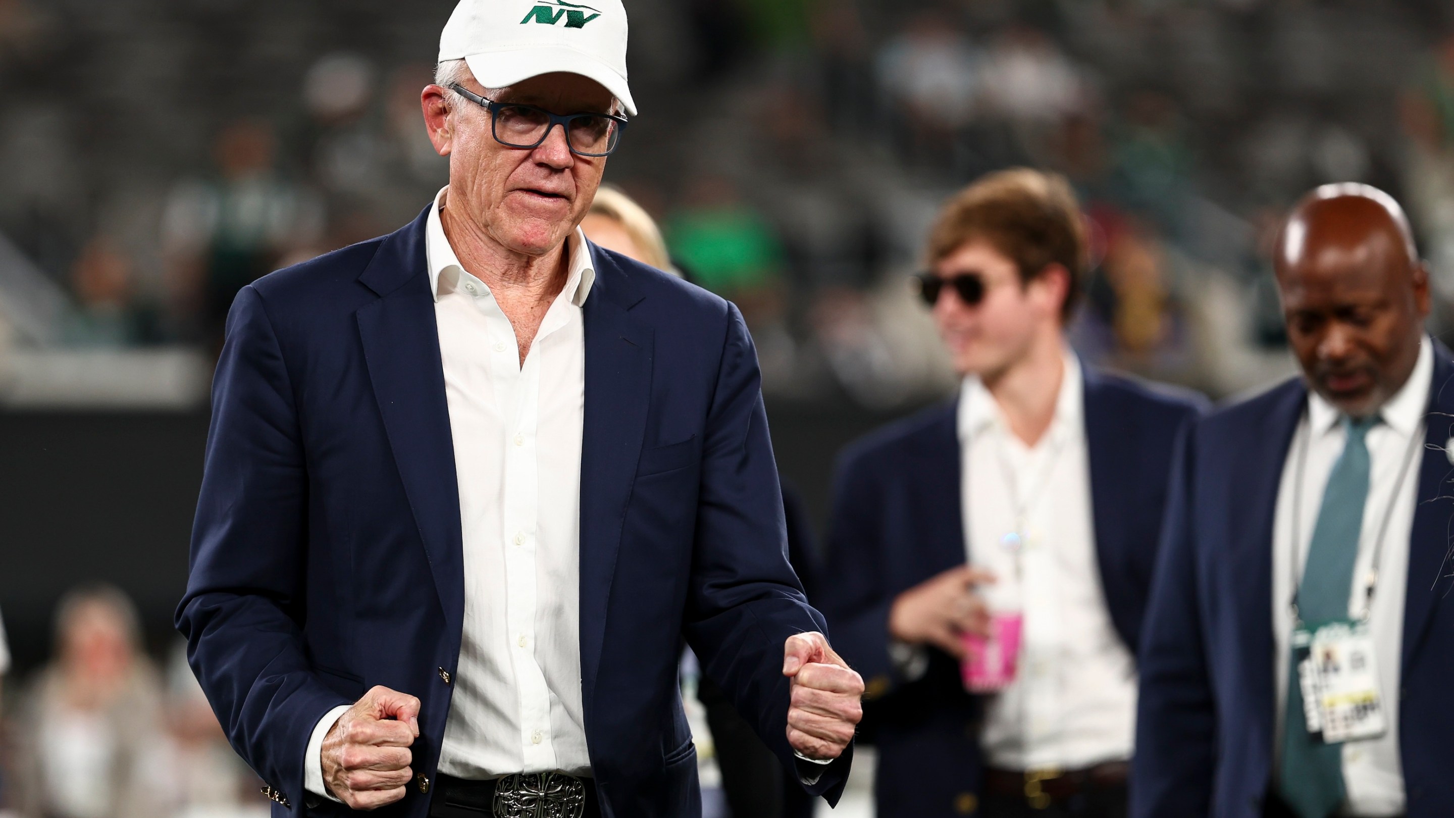 New York Jets owner Woody Johnson stands on the field prior to an NFL football game against the Houston Texans, Thursday at MetLife Stadium on October 31, 2024.