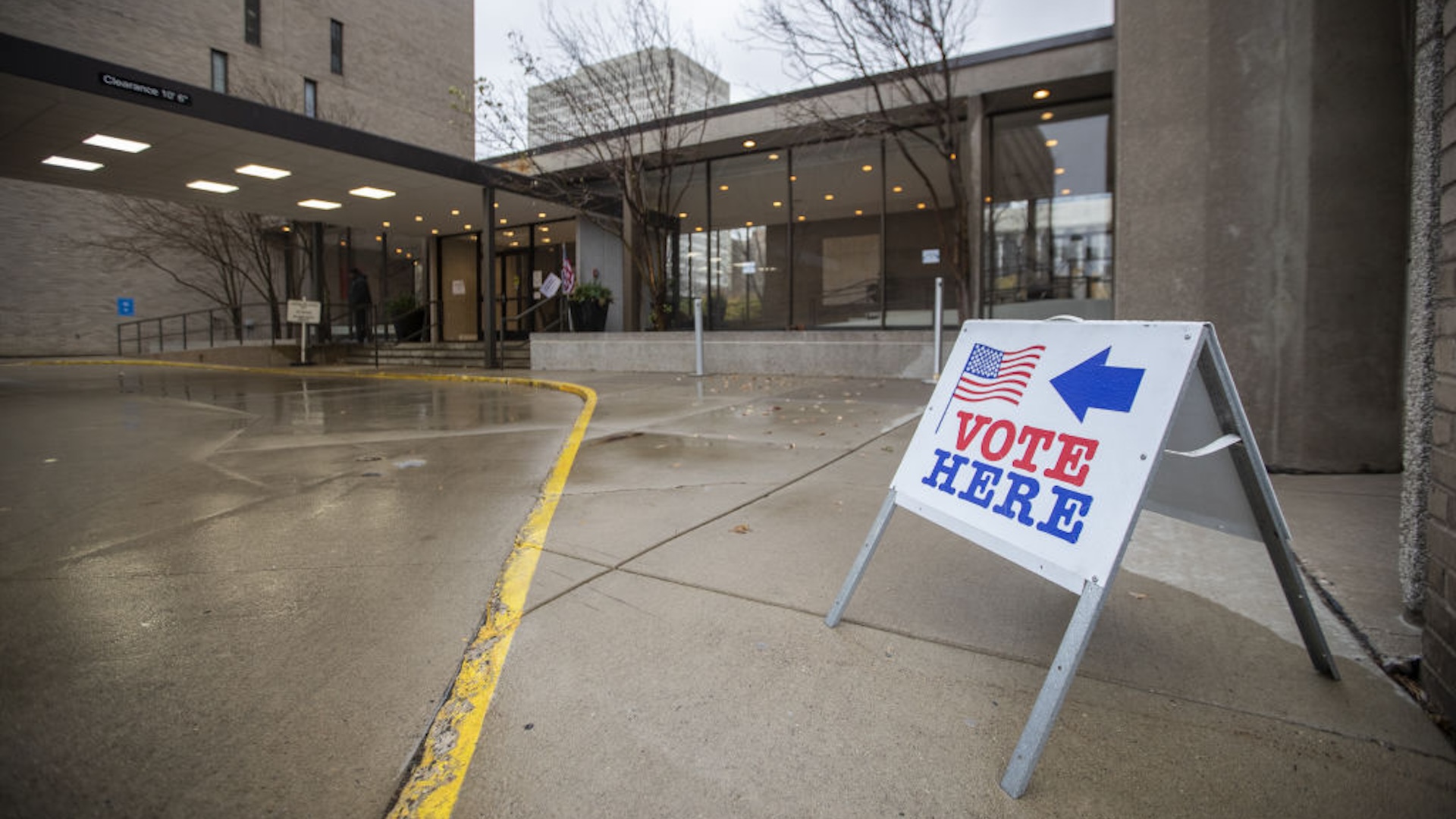 MINNEAPOLIS, MINNESOTA - NOVEMBER 5: A sign points voters where to go for voting at a voting precinct at the Two Towers Condominiums, in Minneapolis, Minnesota on November 5, 2024.