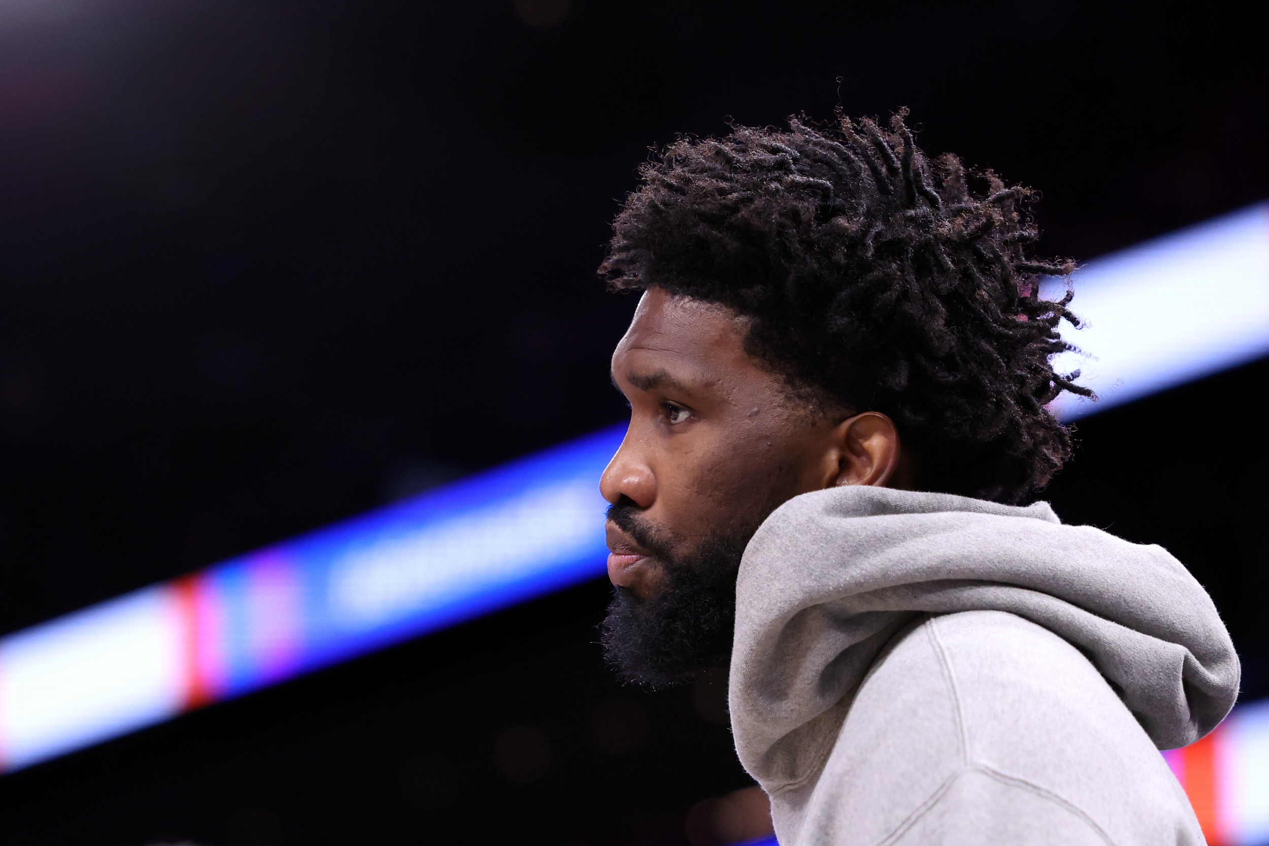 Joel Embiid looks on during a game.