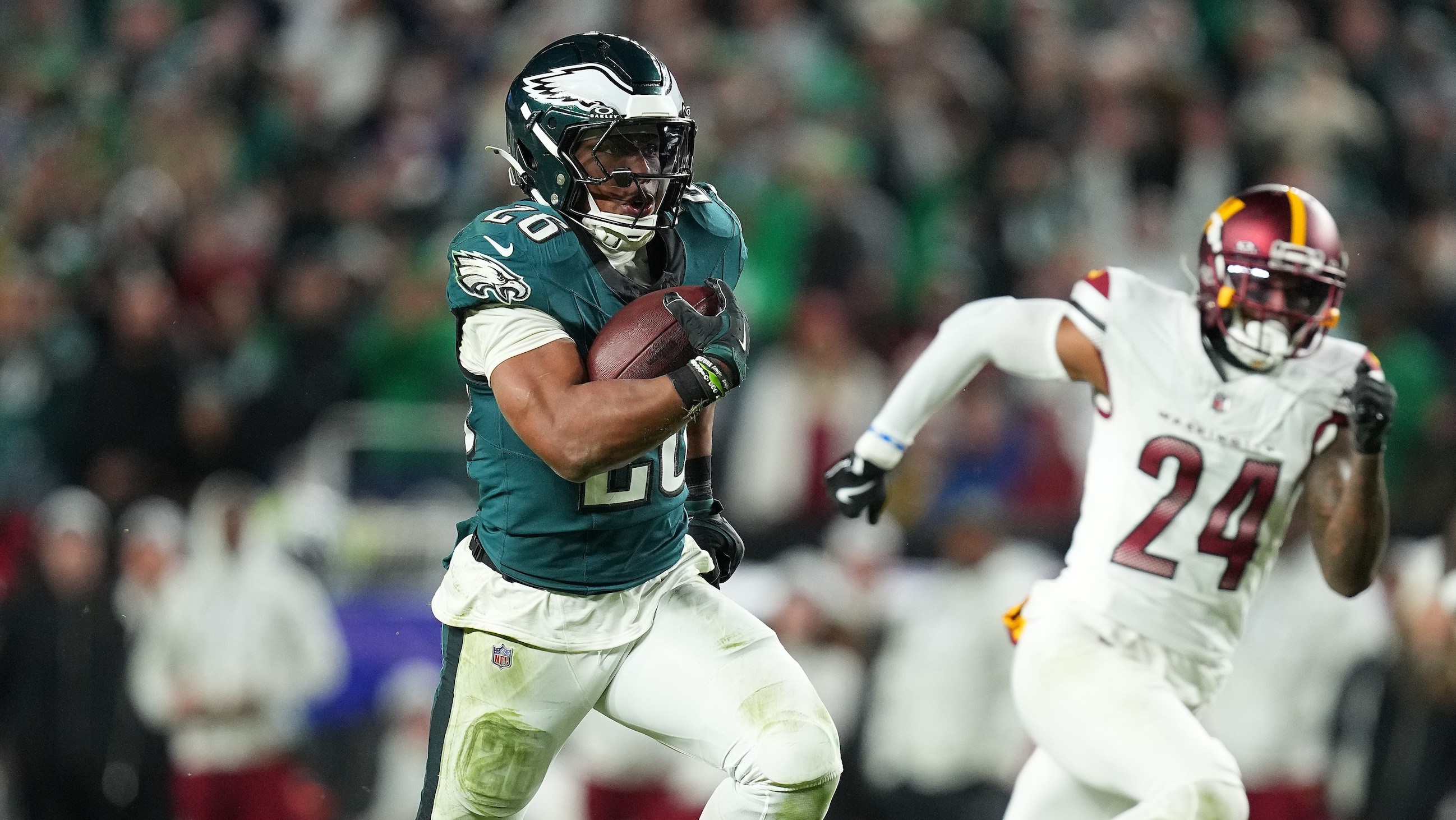 Saquon Barkley runs for a touchdown against the Washington Commanders on November 14, 2024. He's really getting after it.