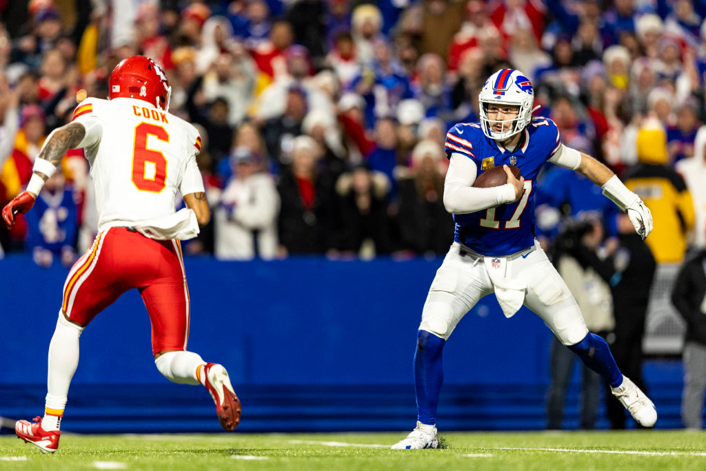 Josh Allen runs the ball to score a touchdown