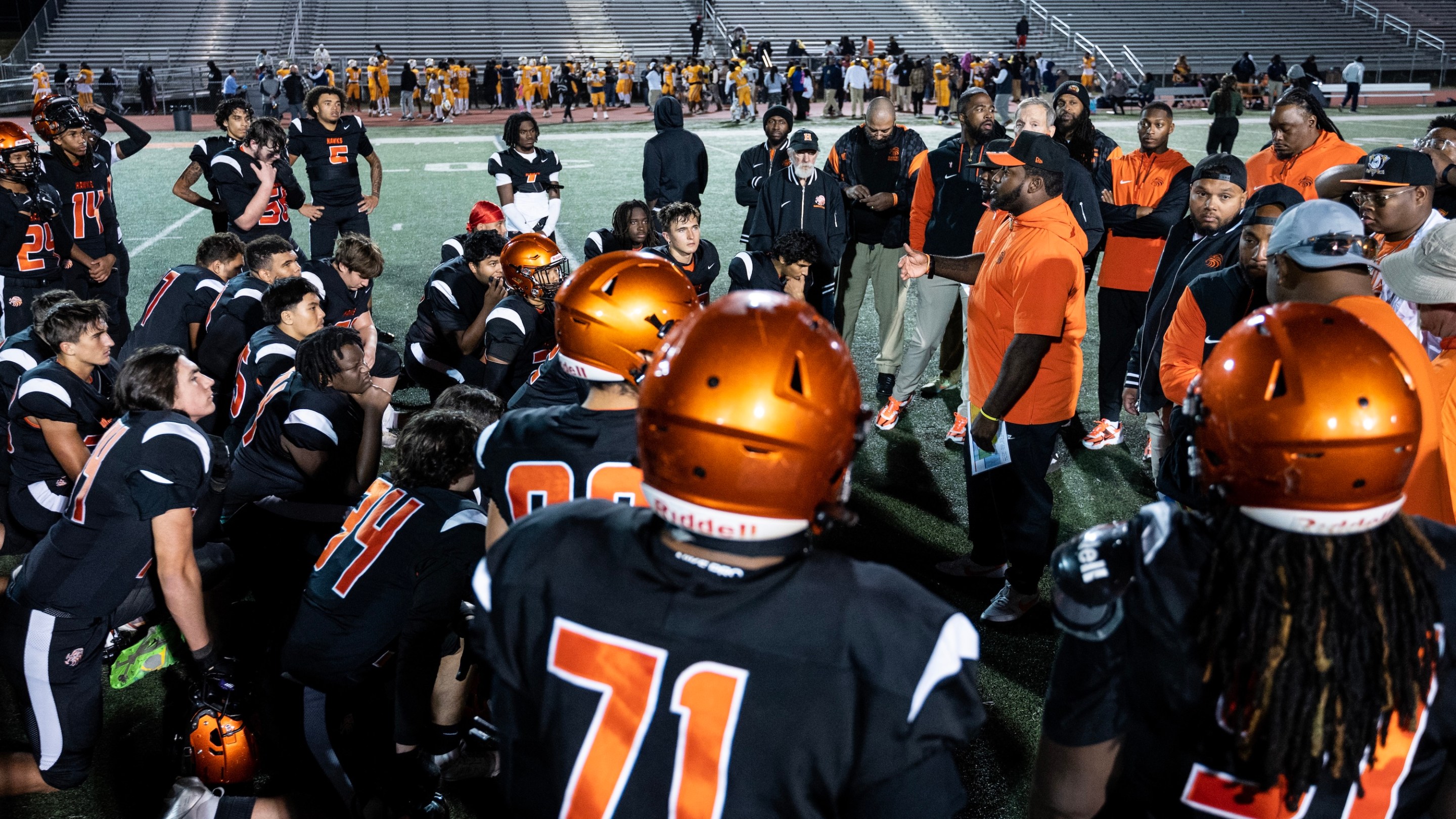 Alexandria, VA - October 25 - Hayfield coach Darryl Overton speaks to his team Friday, Oct. 25, 2024, after they fall to No. 3 Riverdale Baptist at Hayfield High School in Alexandria, Va. (Photo by Luke Johnson for The Washington Post via Getty Images)