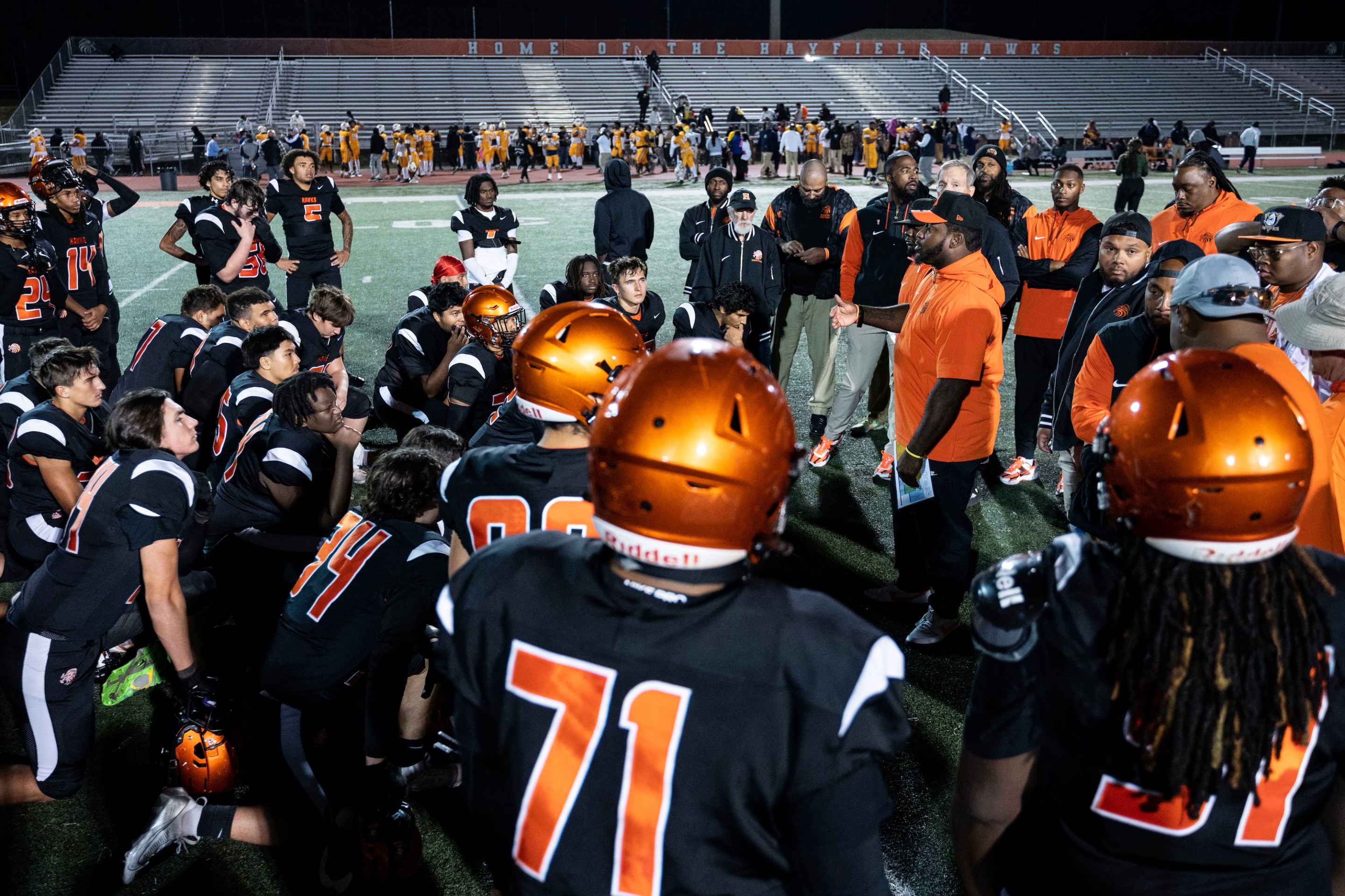 Alexandria, VA - October 25 - Hayfield coach Darryl Overton speaks to his team Friday, Oct. 25, 2024, after they fall to No. 3 Riverdale Baptist at Hayfield High School in Alexandria, Va. (Photo by Luke Johnson for The Washington Post via Getty Images)