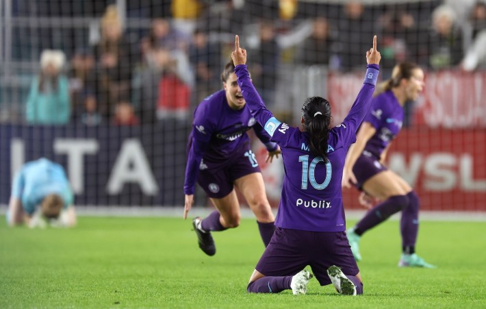 Marta #10 of the Orlando Pride celebrates after defeating the Washington Spirit 1-0 in the NWSL 2024 Championship Game at CPKC Stadium on November 23, 2024 in Kansas City, Missouri.