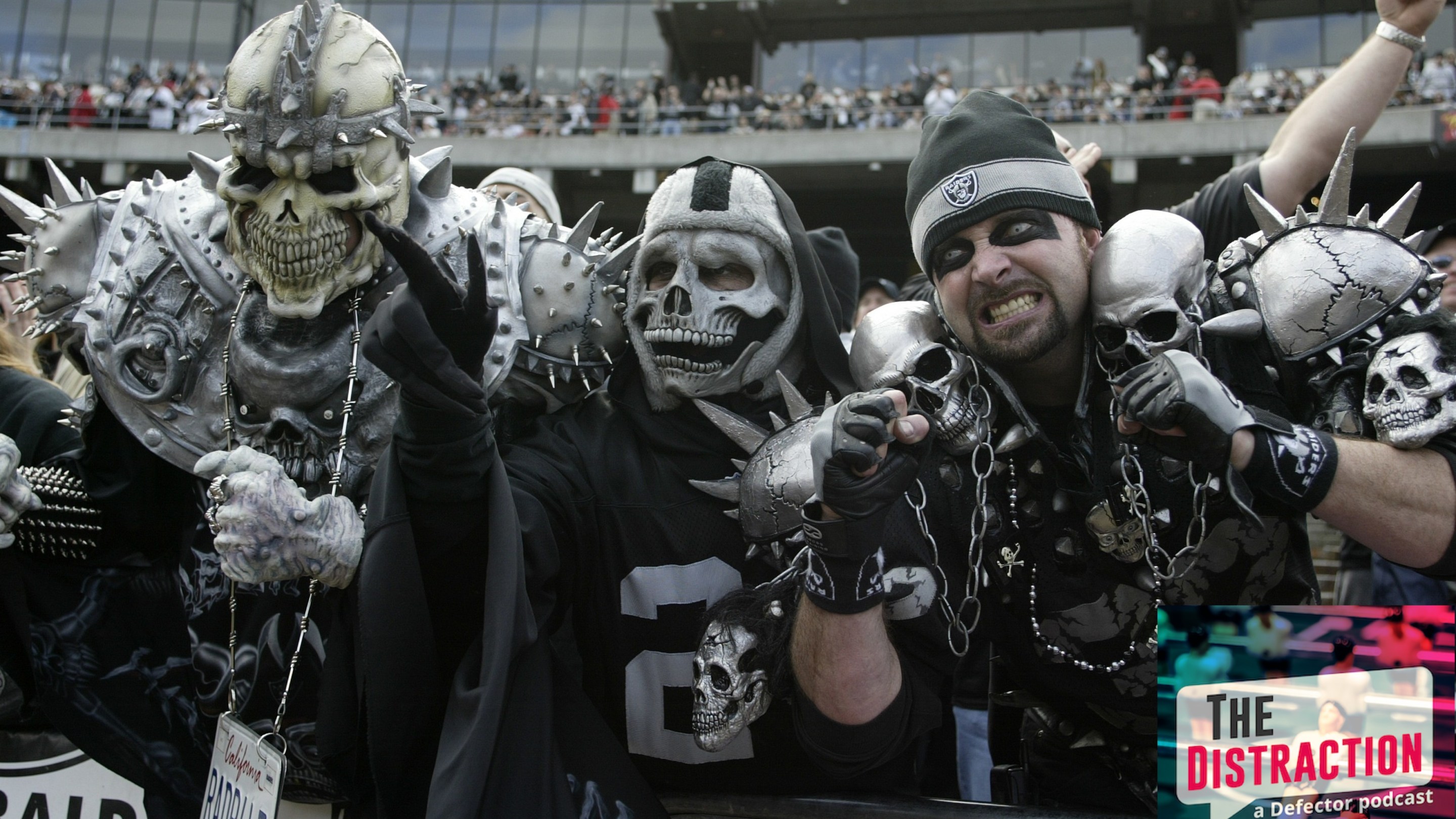 Closeup of painted Oakland Raiders fans in Black Hole during game vs New York Jets in Oakland in 2003. They've got like weird helmets and skull stuff going on.