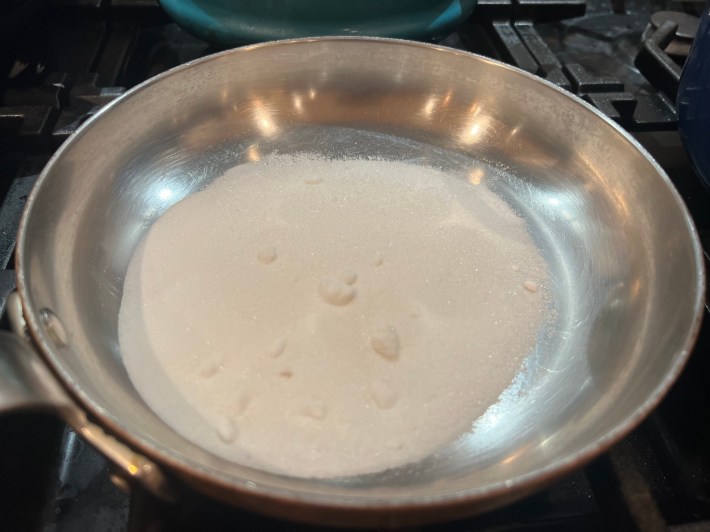 Caster sugar in a pan.