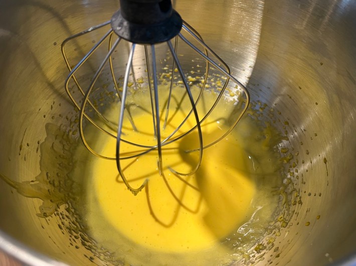 Egg yolks and caster sugar, mixed together in a stand mixer.