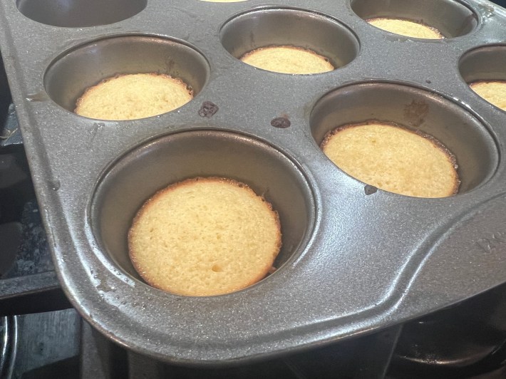 Browning around the edges of baked cake sponges.