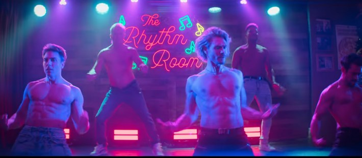 Chad Michael Murray and several other shirtless review dancers show abs on stage