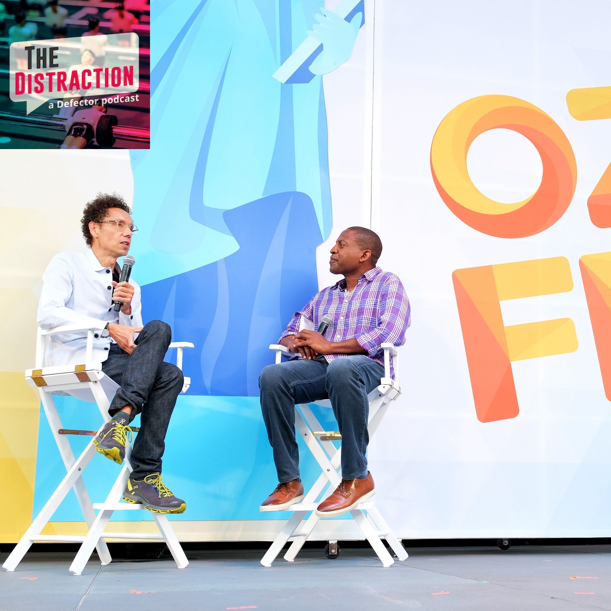 Malcolm Gladwell and Carlos Watson speak onstage during OZY Fest 2018 at Rumsey Playfield, Central Park on July 22, 2018 in New York City.