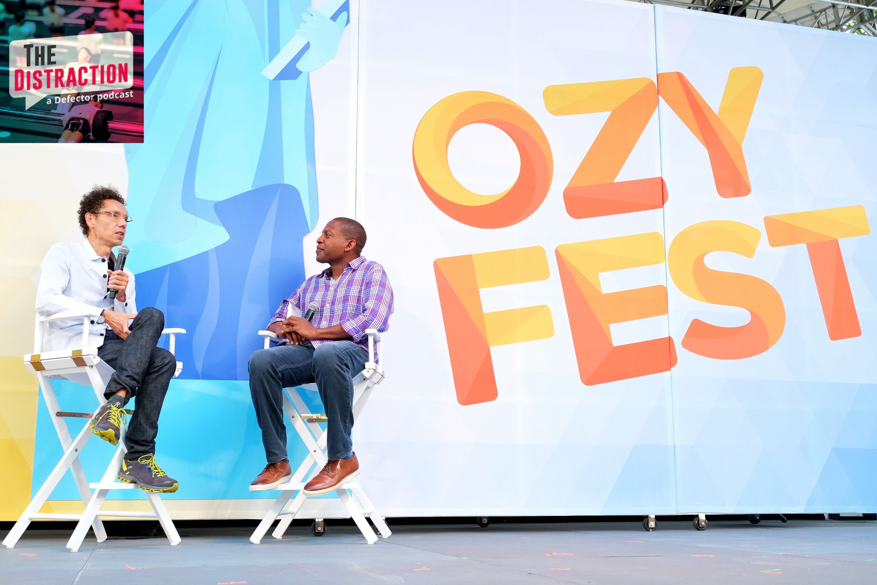 Malcolm Gladwell and Carlos Watson speak onstage during OZY Fest 2018 at Rumsey Playfield, Central Park on July 22, 2018 in New York City.