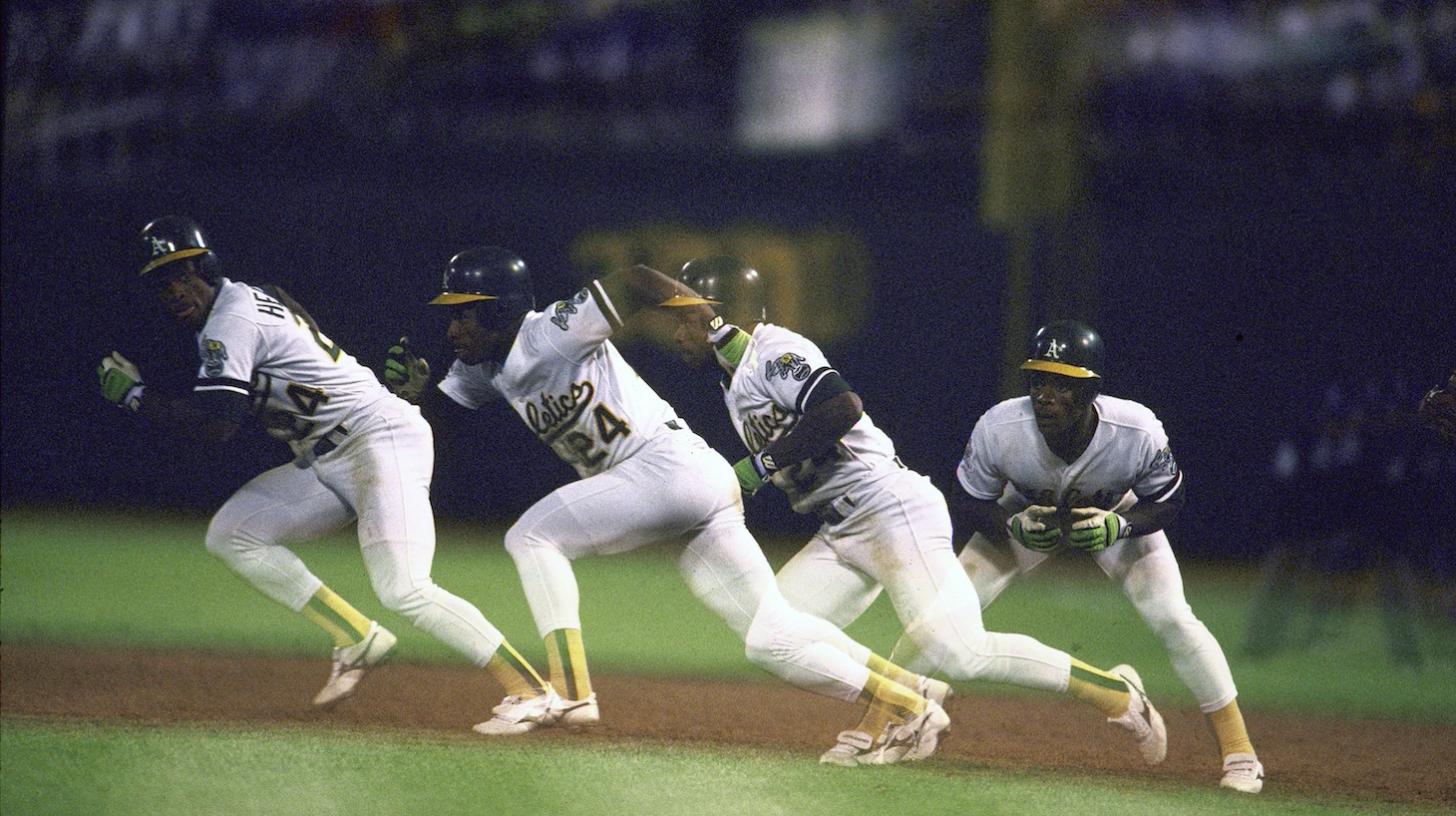 Multiple exposure of Oakland Athletics Rickey Henderson (24) in action, stealing base vs San Francisco Giants. Game 1. Oakland, CA 10/14/1989