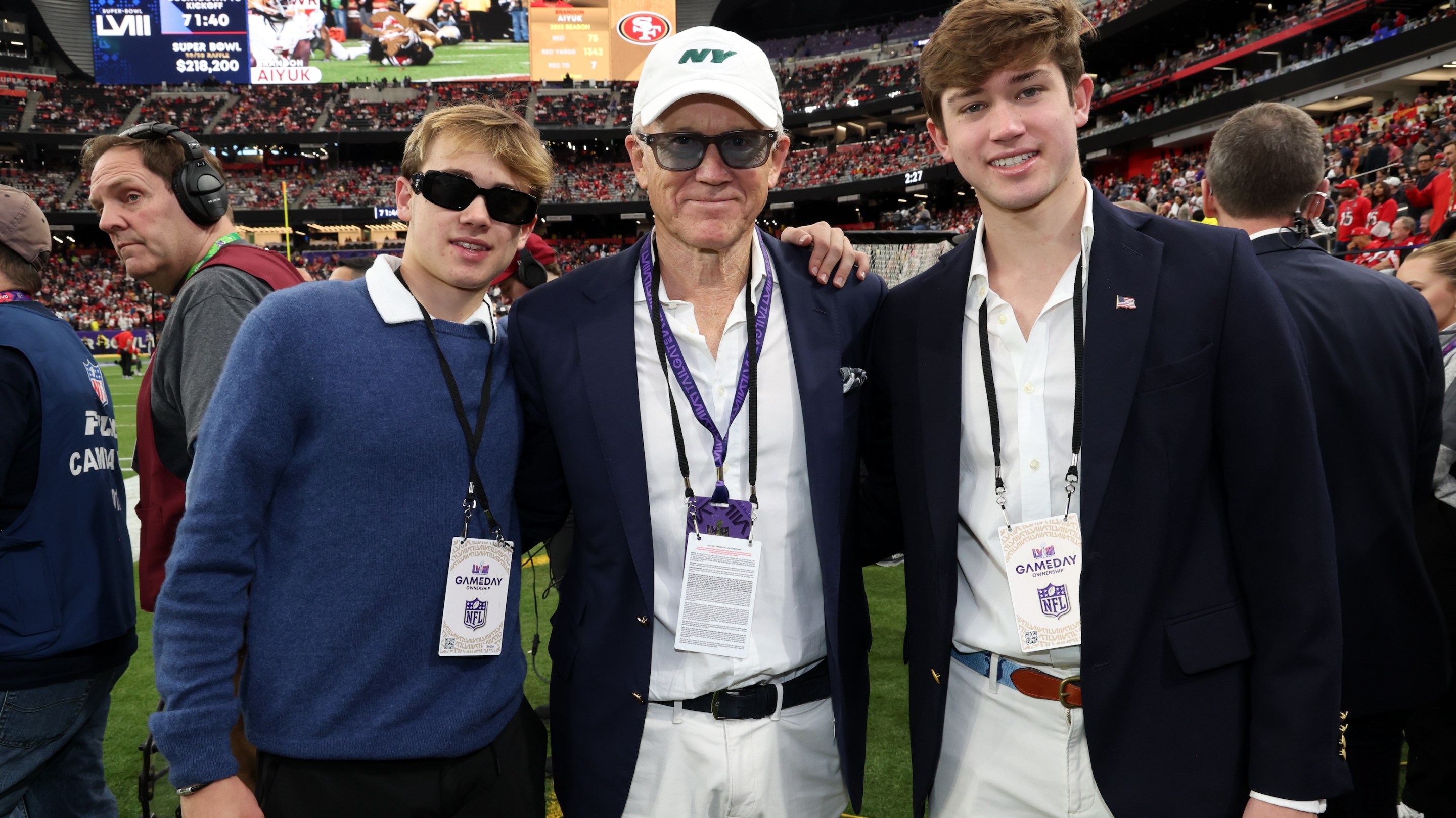 Woody Johnson (center) and his sons attend the Super Bowl LVIII Pregame at Allegiant Stadium on February 11, 2024 in Las Vegas.