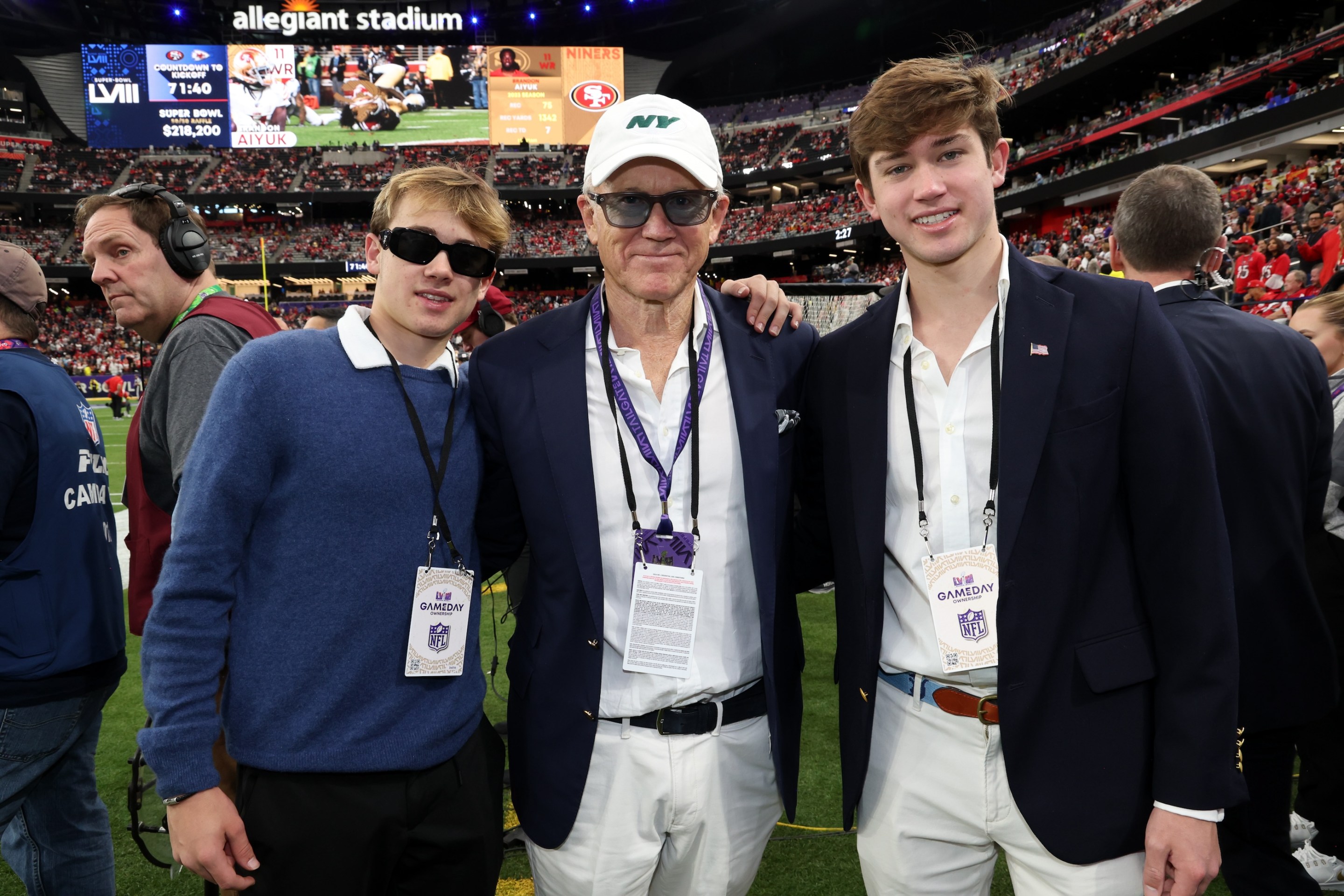 Woody Johnson (center) and his sons attend the Super Bowl LVIII Pregame at Allegiant Stadium on February 11, 2024 in Las Vegas.