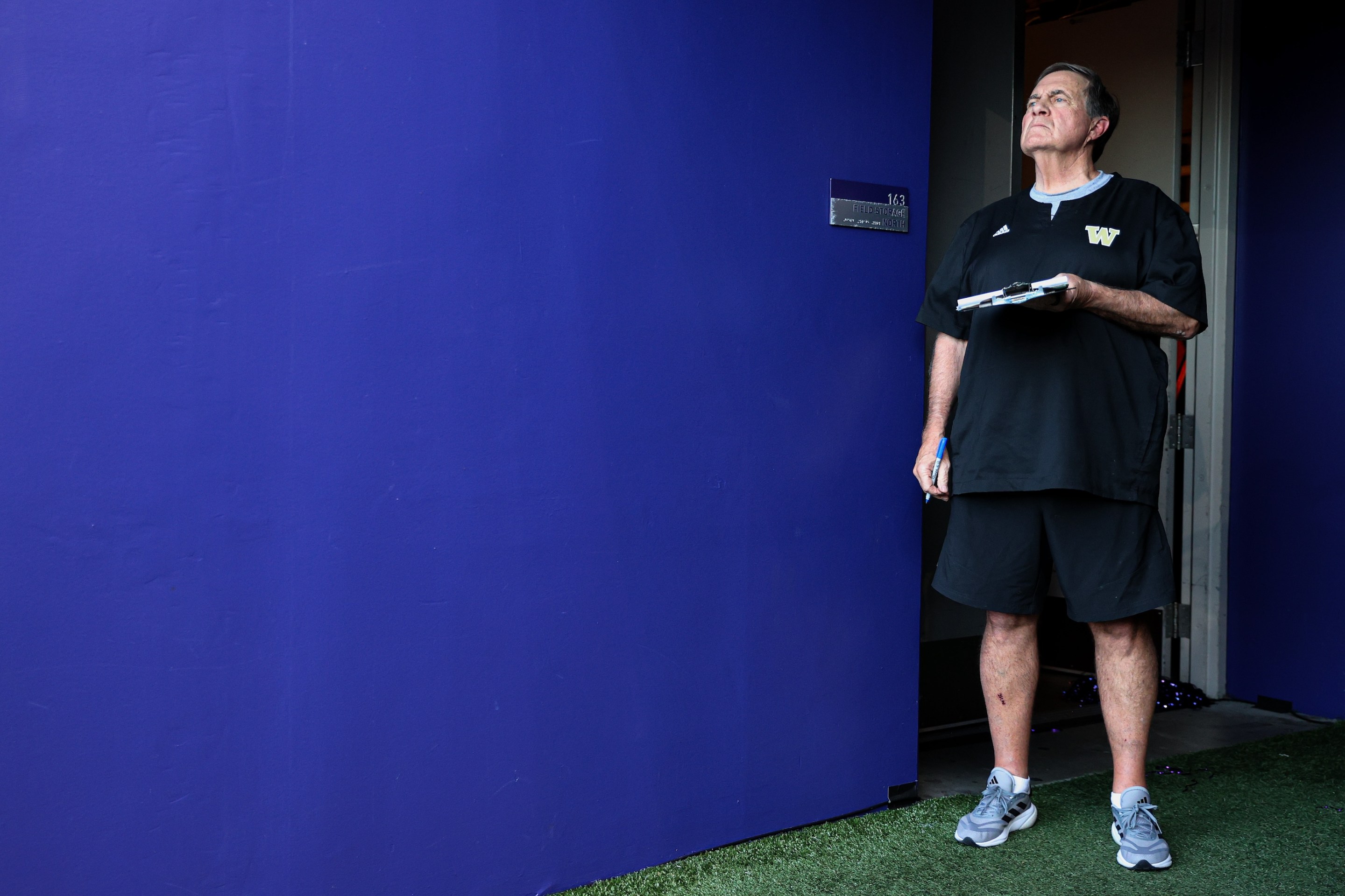 Bill Belichick, former NFL coach, looks on during the game between the Washington Huskies and the Michigan Wolverines at Husky Stadium on October 5, 2024.