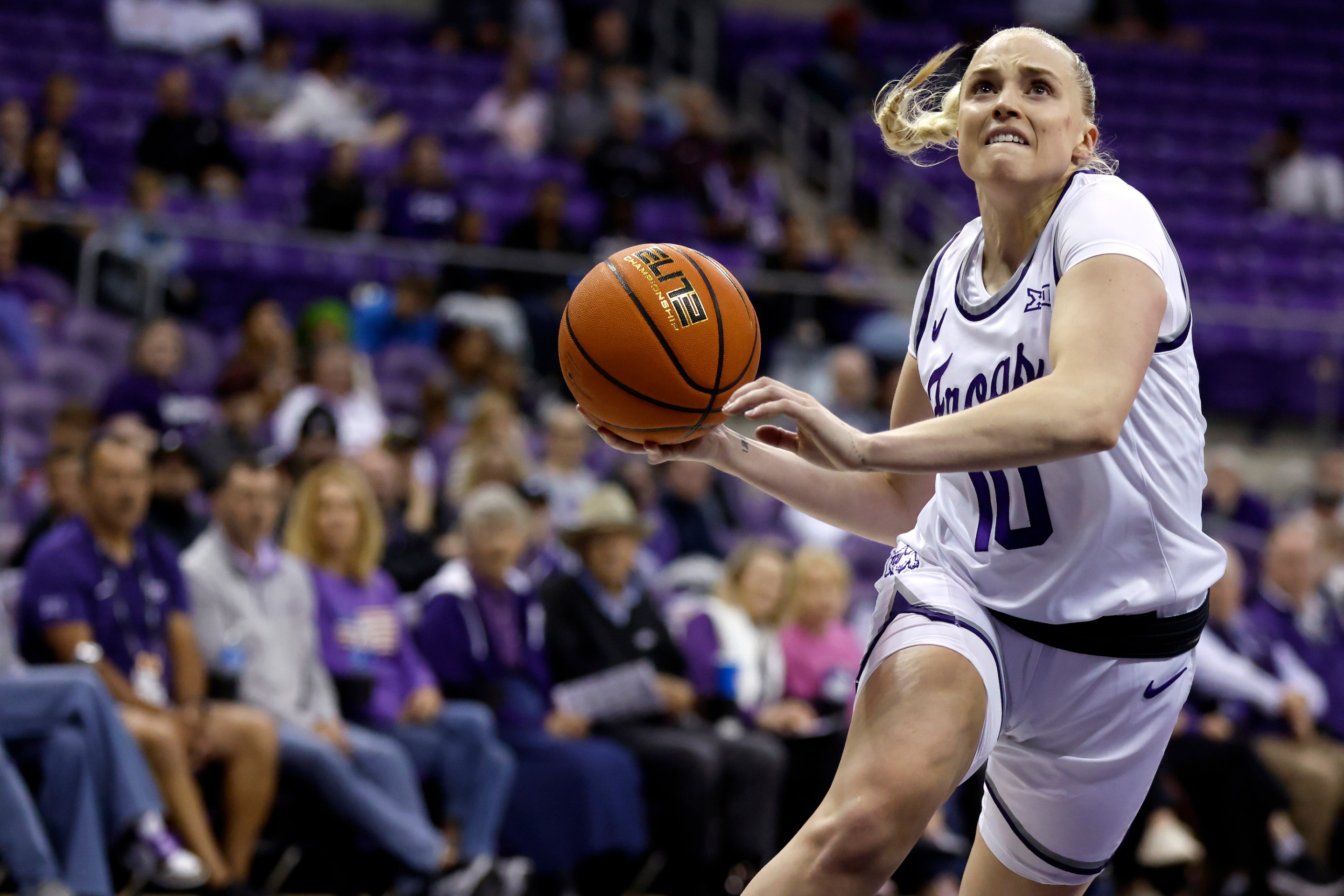 Hailey Van Lith #10 of the TCU Horned Frogs goes to the basket against the Houston Christian Huskies in the second half at Schollmaier Arena on November 5, 2024 in Fort Worth, Texas.