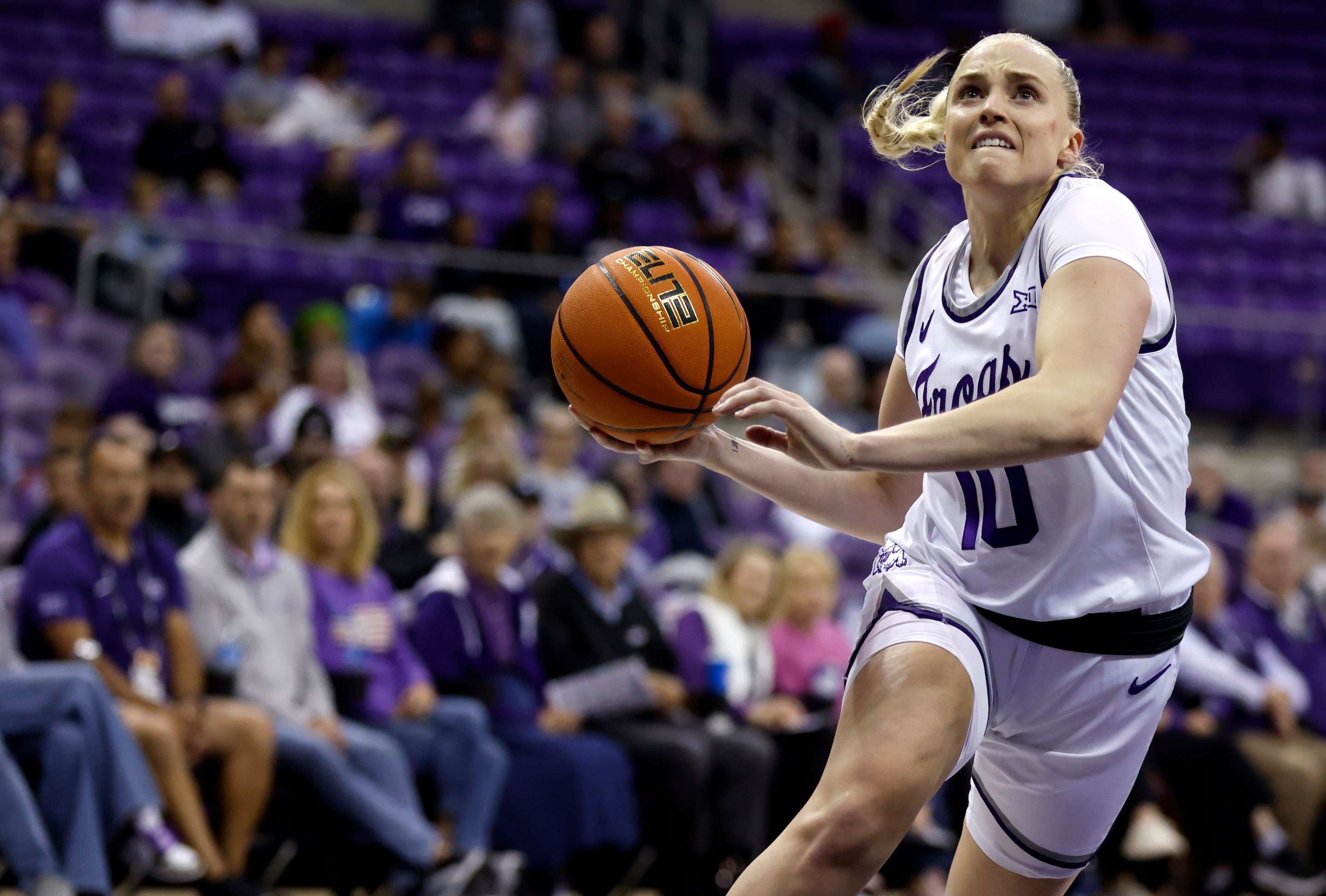 Hailey Van Lith #10 of the TCU Horned Frogs goes to the basket against the Houston Christian Huskies in the second half at Schollmaier Arena on November 5, 2024 in Fort Worth, Texas.