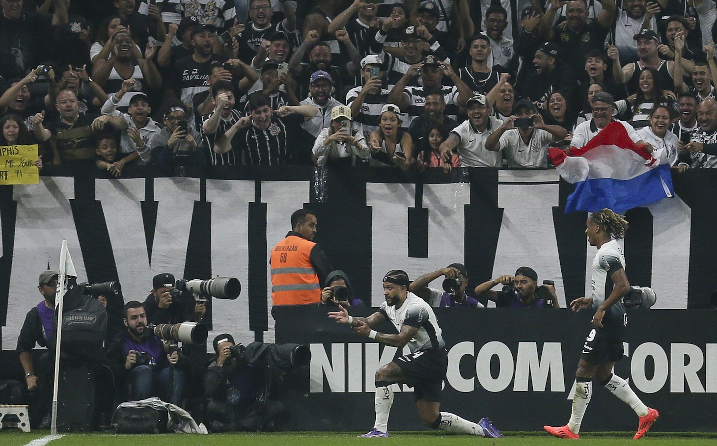 Memphis Depay of Corinthians celebrates after scoring the team's third goal during the Brasileirao 2024 match between Corinthians and Bahia at Neo Quimica Arena on December 3, 2024 in Sao Paulo, Brazil.