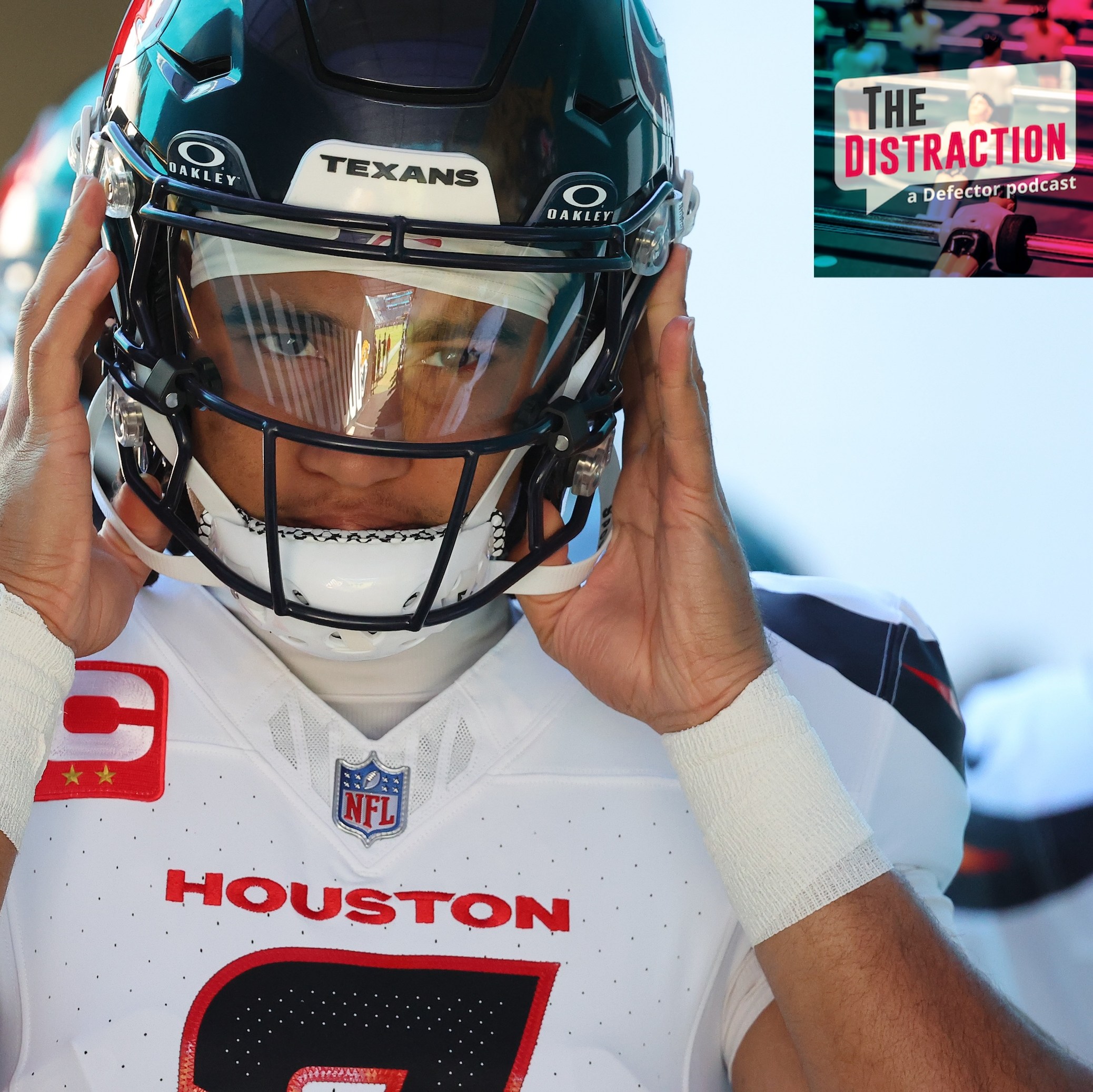 C.J. Stroud of the Houston Texans adjusts his helmet in close-up before taking the field for Houston's game against Jacksonville on December 1, 2024.