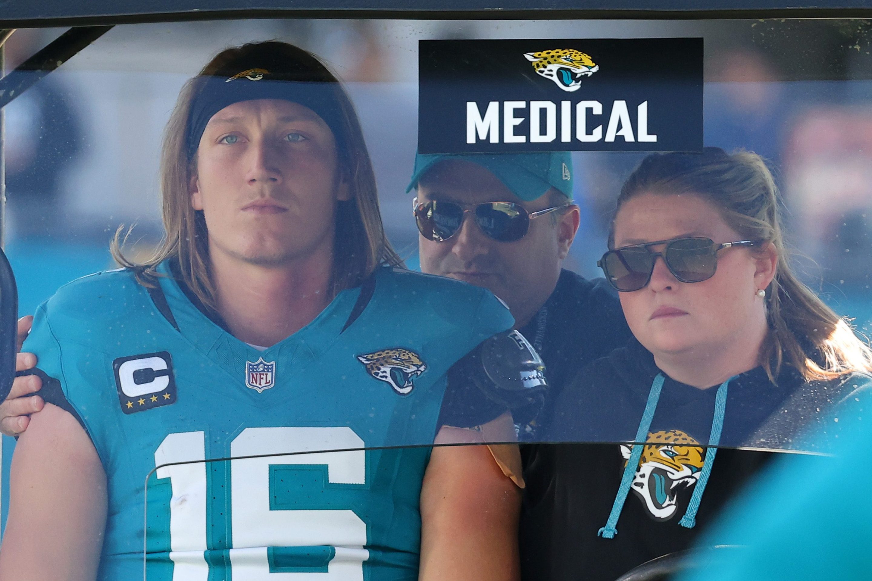 Quarterback Trevor Lawrence #16 of the Jacksonville Jaguars is taken off the field in a medical cart during the second quarter of a game against the Houston Texans at EverBank Stadium on December 01, 2024 in Jacksonville, Florida.