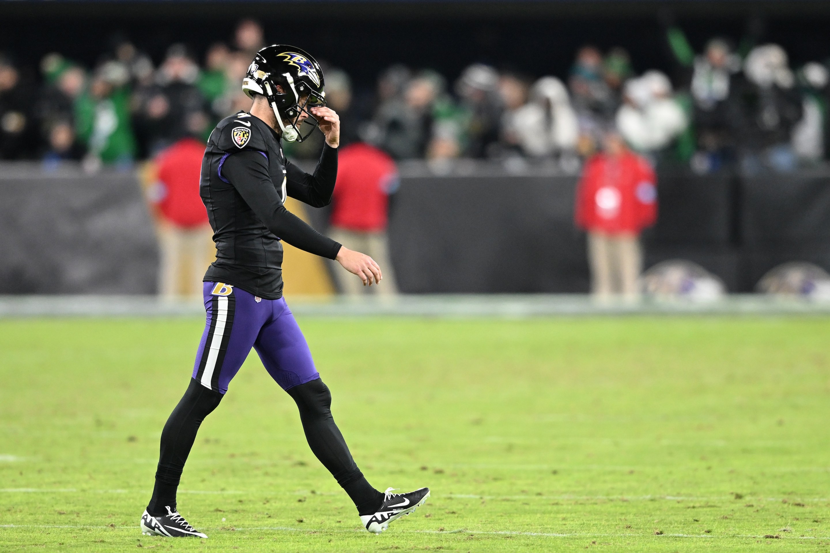 Justin Tucker of the Baltimore Ravens reacts during the third quarter after missing a field goal against the Philadelphia Eagles on December 1, 2024.