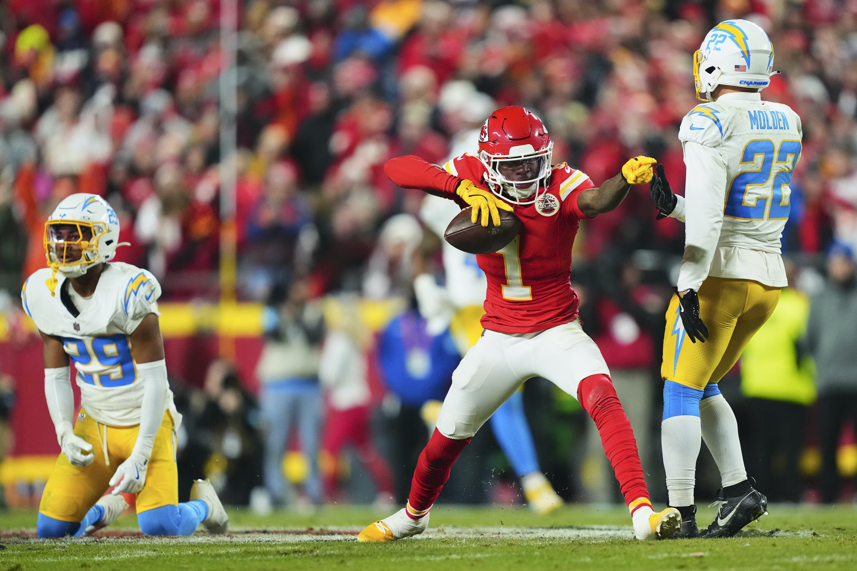 Xavier Worthy celebrates a first down in the Chargers-Chiefs game.