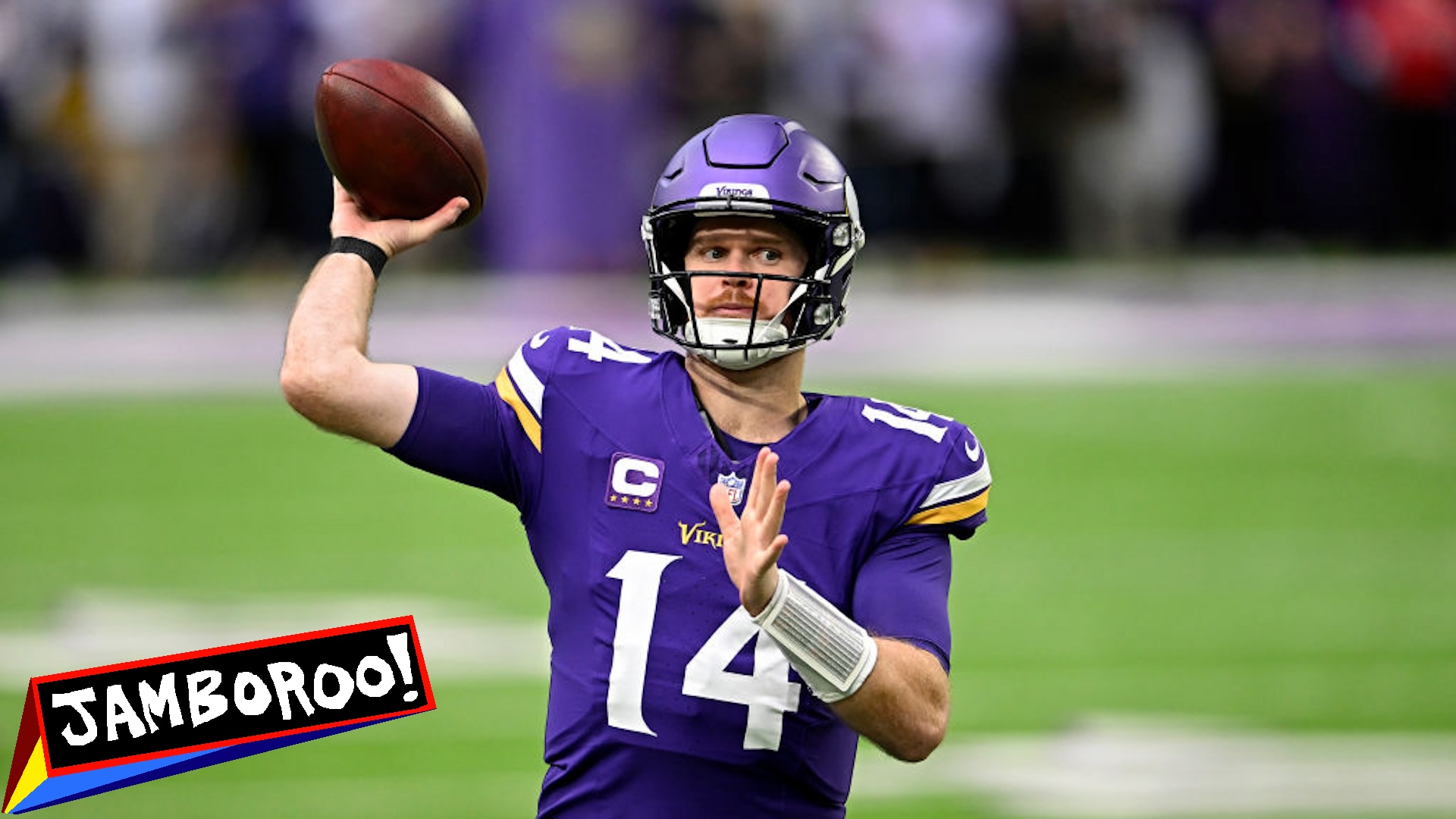 MINNEAPOLIS, MINNESOTA - DECEMBER 08: Sam Darnold #14 of the Minnesota Vikings warms up before the game against the Atlanta Falcons at U.S. Bank Stadium on December 08, 2024 in Minneapolis, Minnesota.