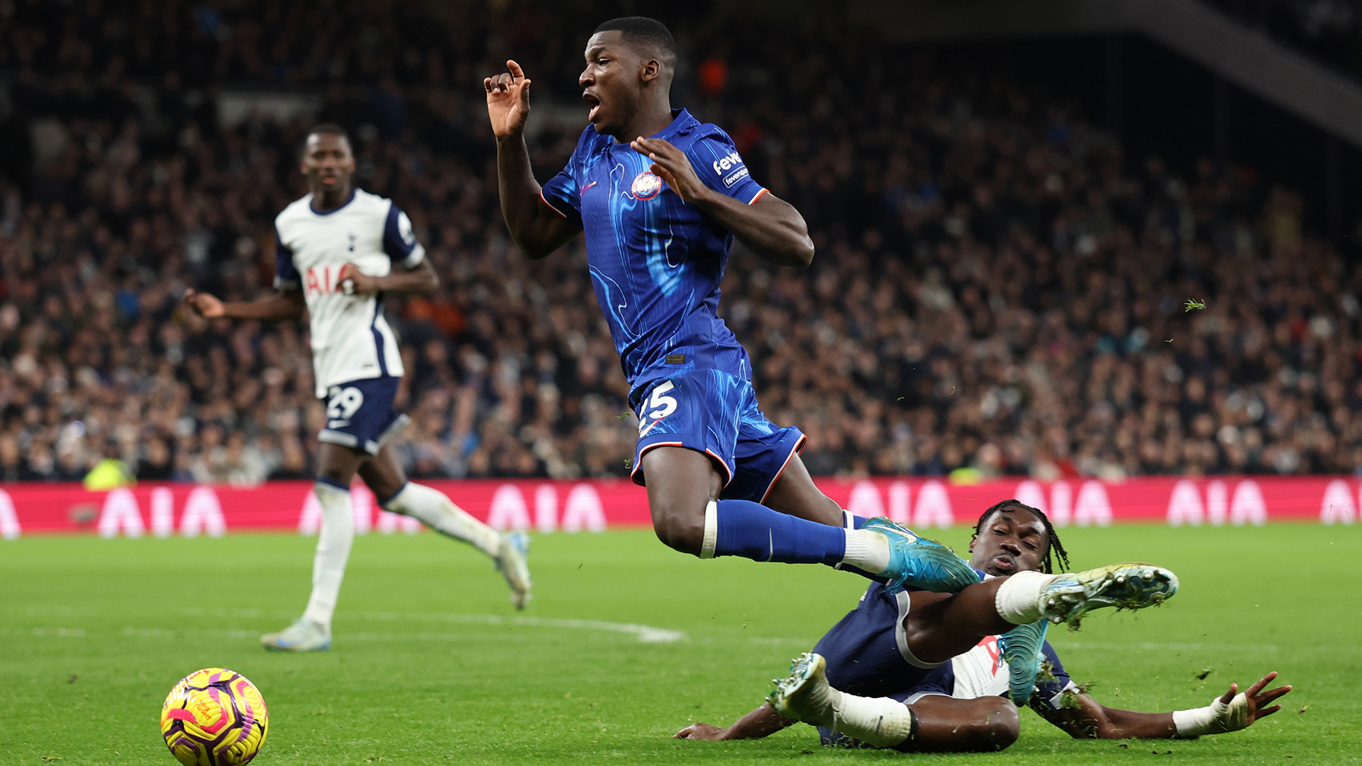 Moises Caicedo of Chelsea is fouled by Yves Bissouma of Tottenham Hotspur leading to a penalty which is scored by Cole Palmer of Chelsea to make it 2-2 during the Premier League match between Tottenham Hotspur FC and Chelsea FC at Tottenham Hotspur Stadium on December 08, 2024 in London, England.