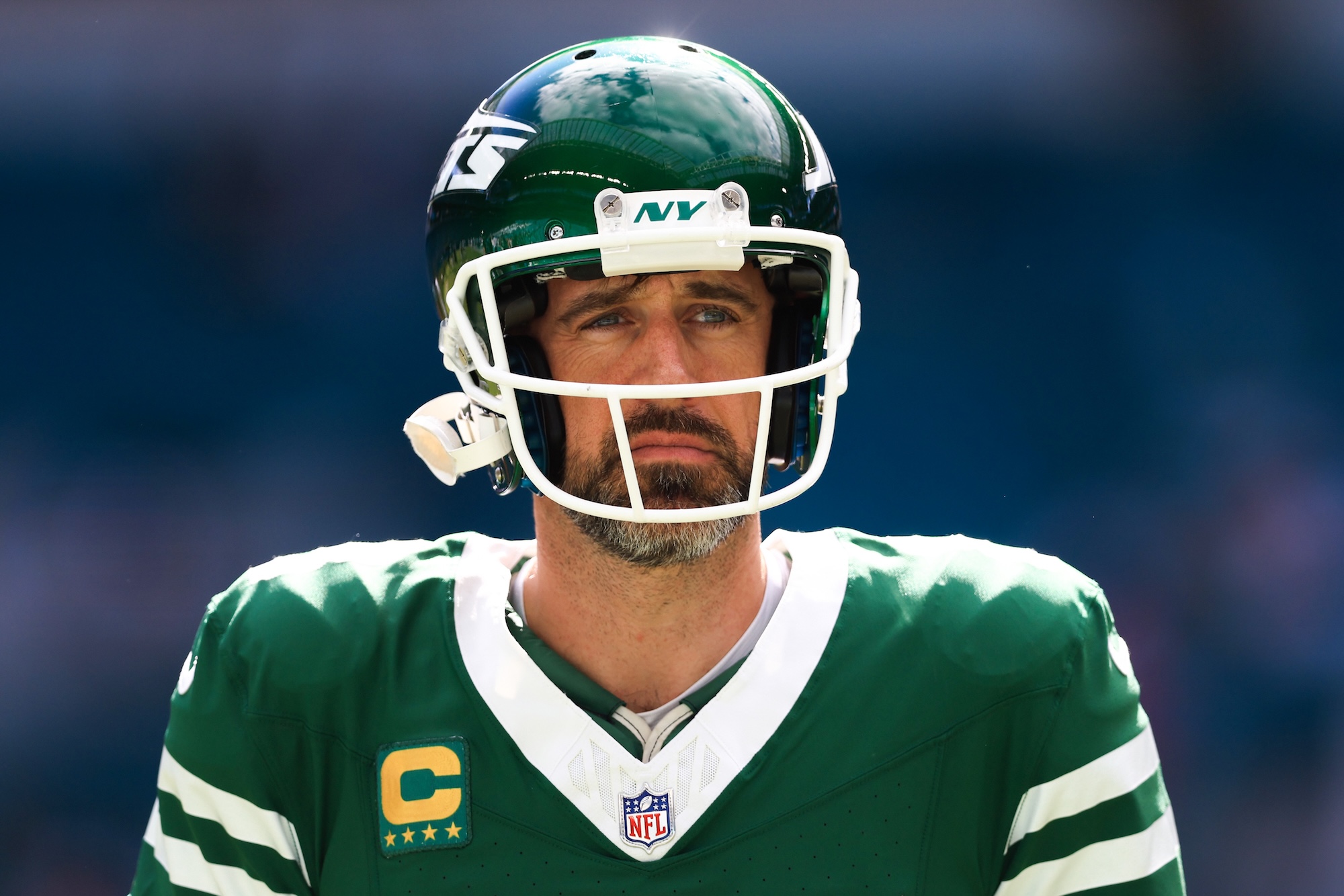 MIAMI GARDENS, FLORIDA - DECEMBER 08: Aaron Rodgers #8 of the New York Jets looks on prior to a game against the Miami Dolphins at Hard Rock Stadium on December 08, 2024 in Miami Gardens, Florida. (Photo by Megan Briggs/Getty Images)